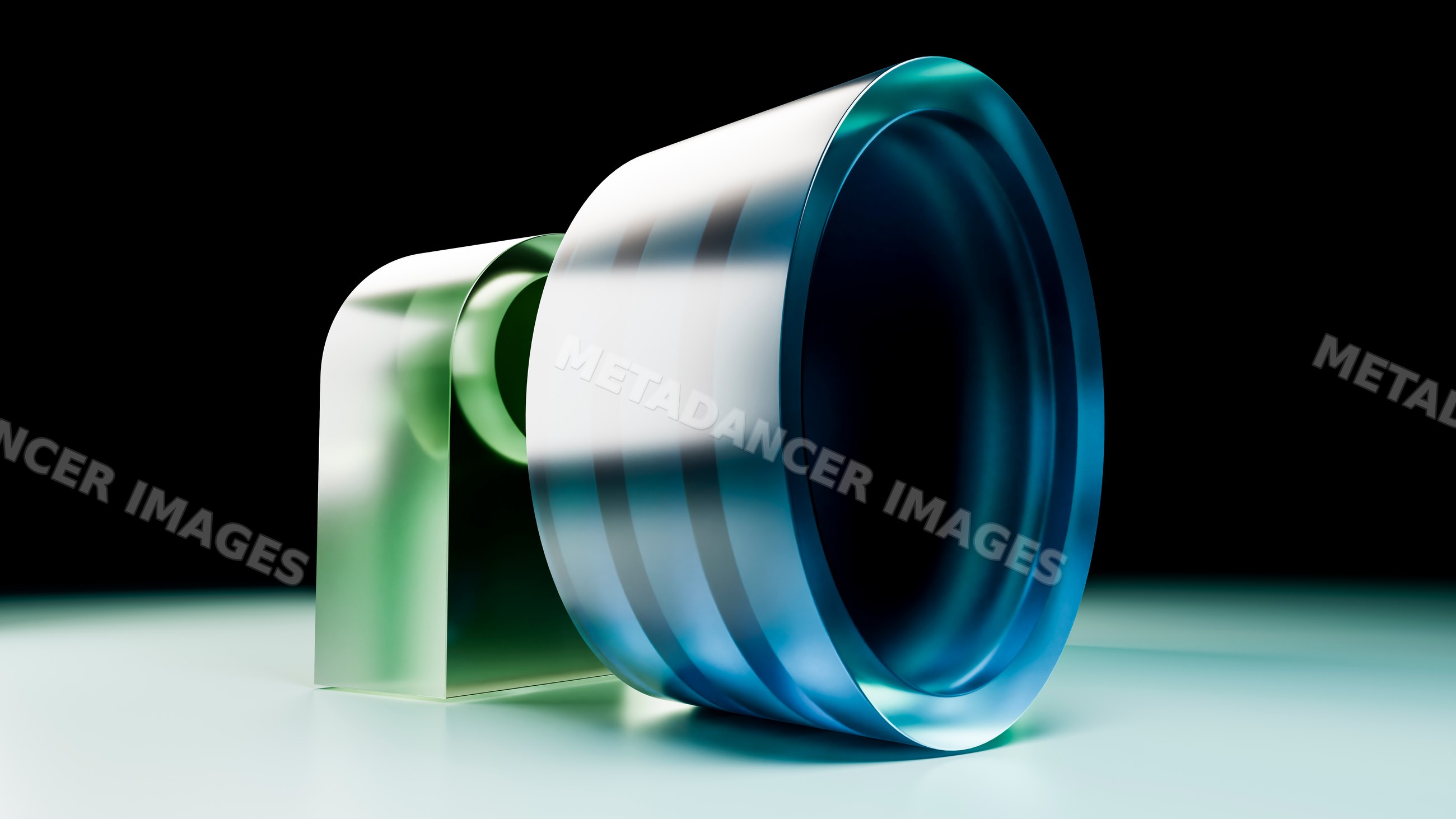 Glass lens with blue and green tints isolated on dark background