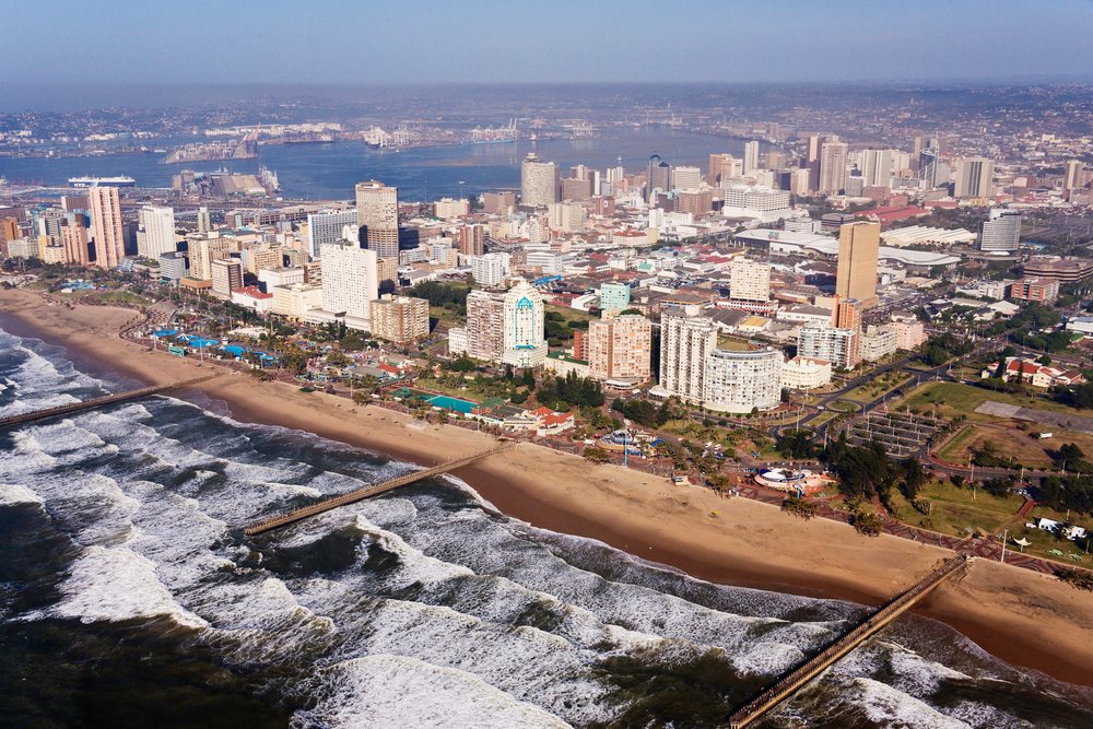Golden mile beachfront with piers and city skyline south africa