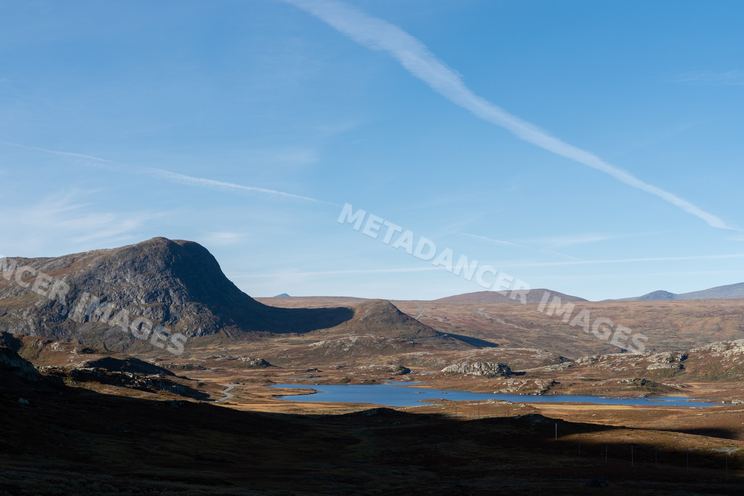 Mountain and lake landscape under clear sky
