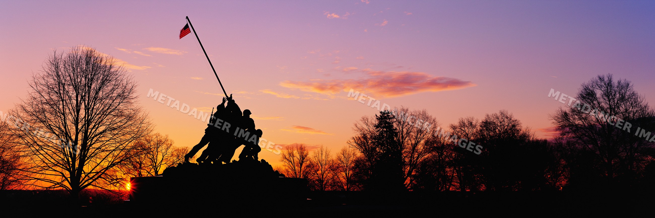 Iwo jima memorial silhouette at sunset
