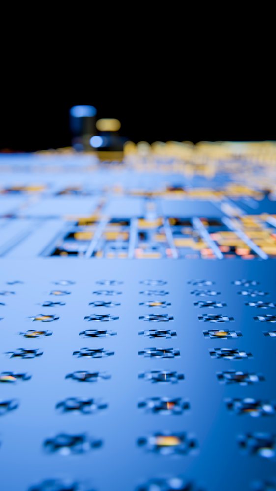 Close-up of blue circuit board with electronic components