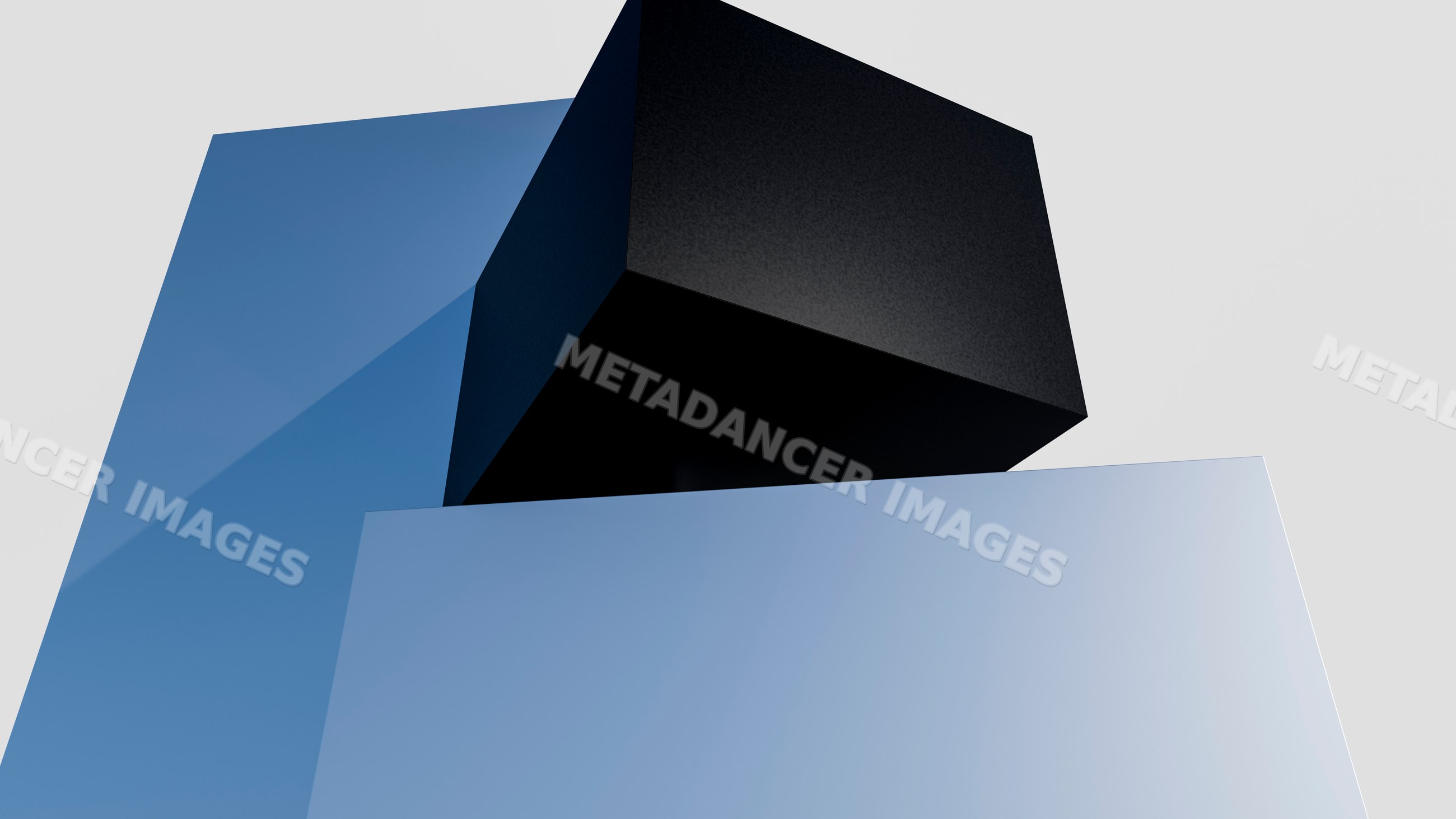 Two stacked cubes create a minimalist black and blue geometric