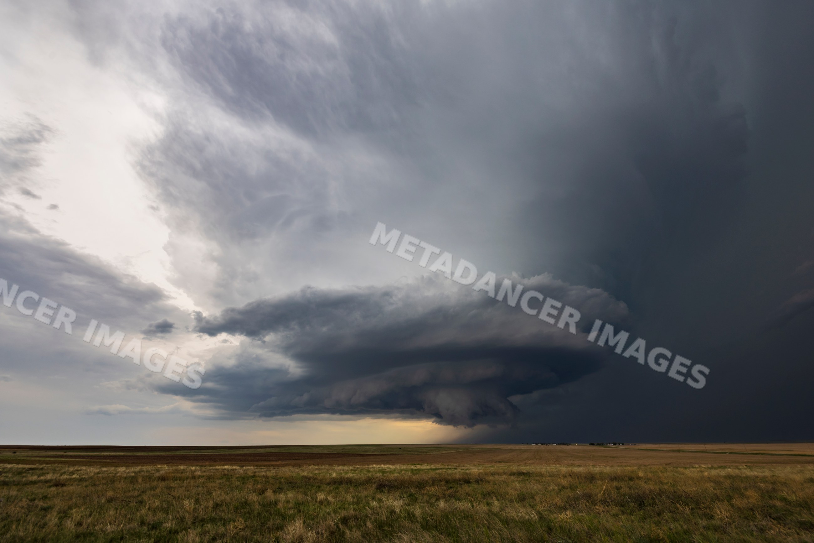 Supercell storm over grassland near merino, colorado