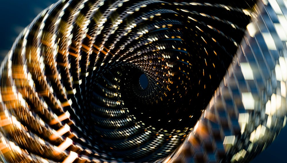 Close-up digital rendering of a twisting metal spiral structure