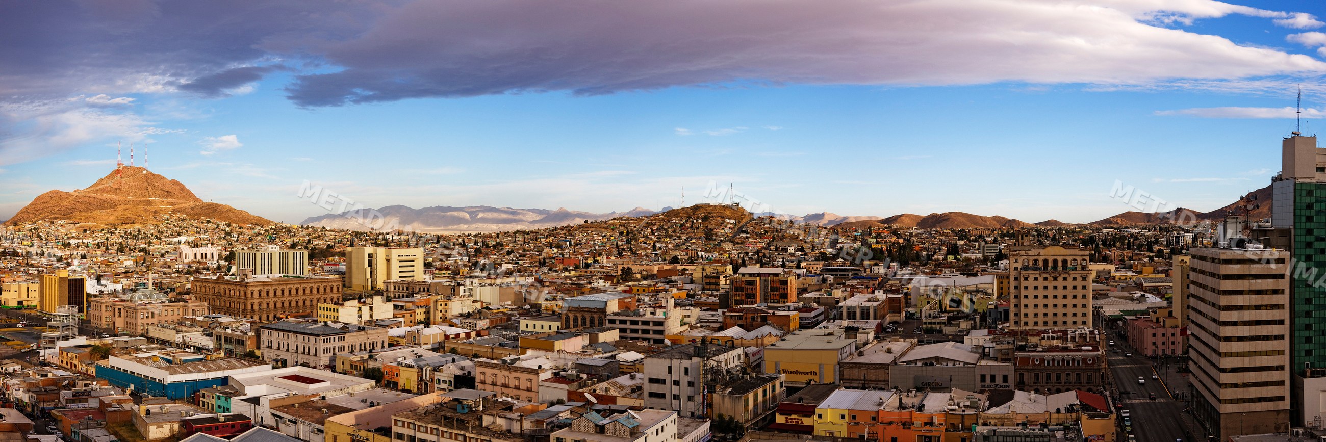 Panoramic cityscape view of chihuahua with mountains and buildings