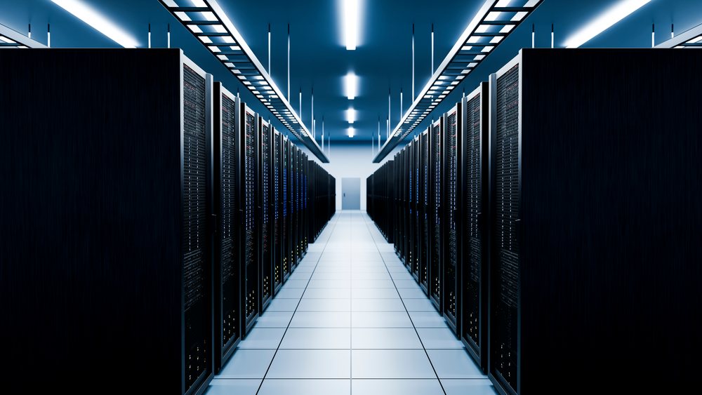 Server racks in modern data center aisle