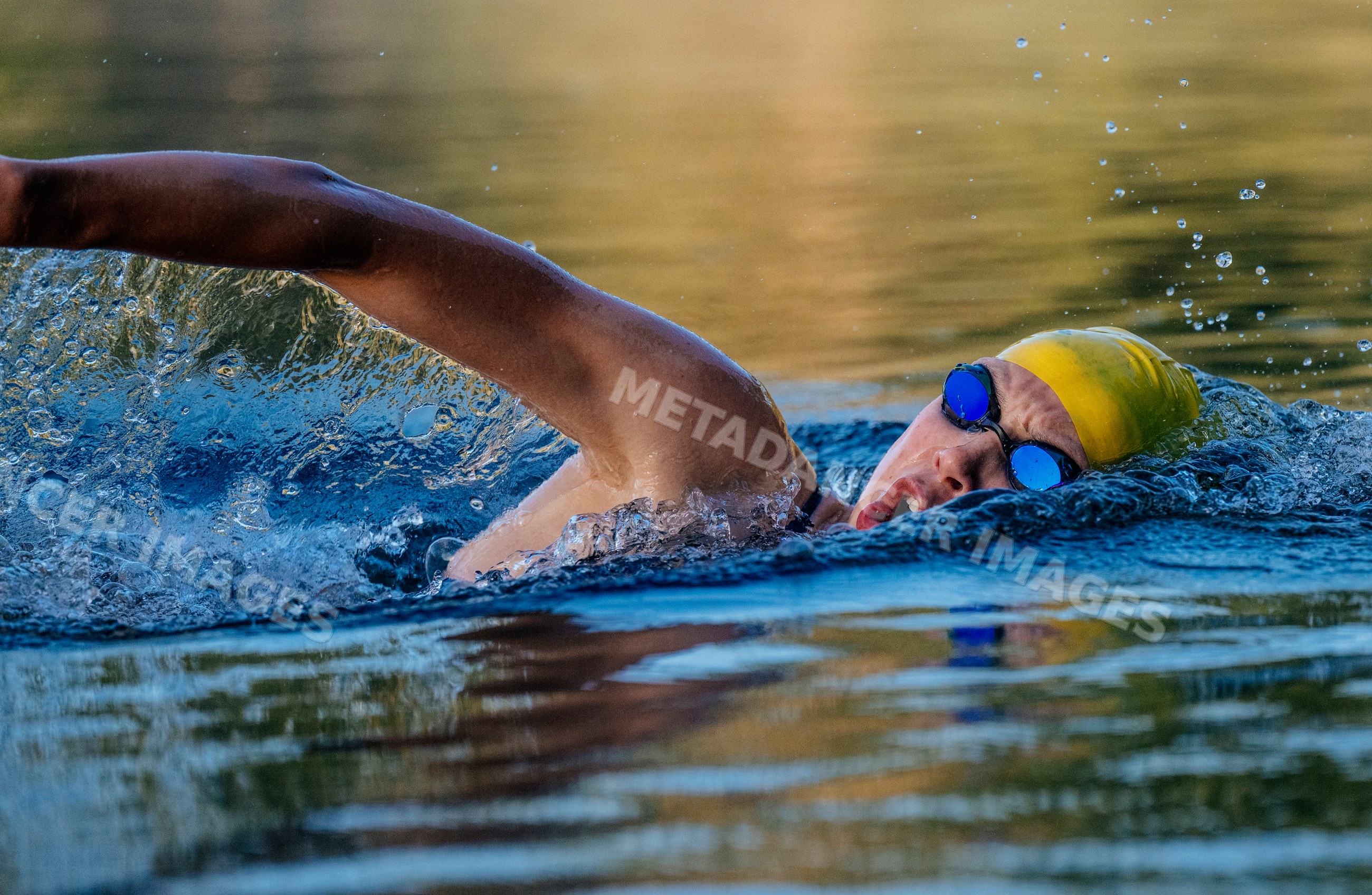 White swimmer performing freestyle stroke