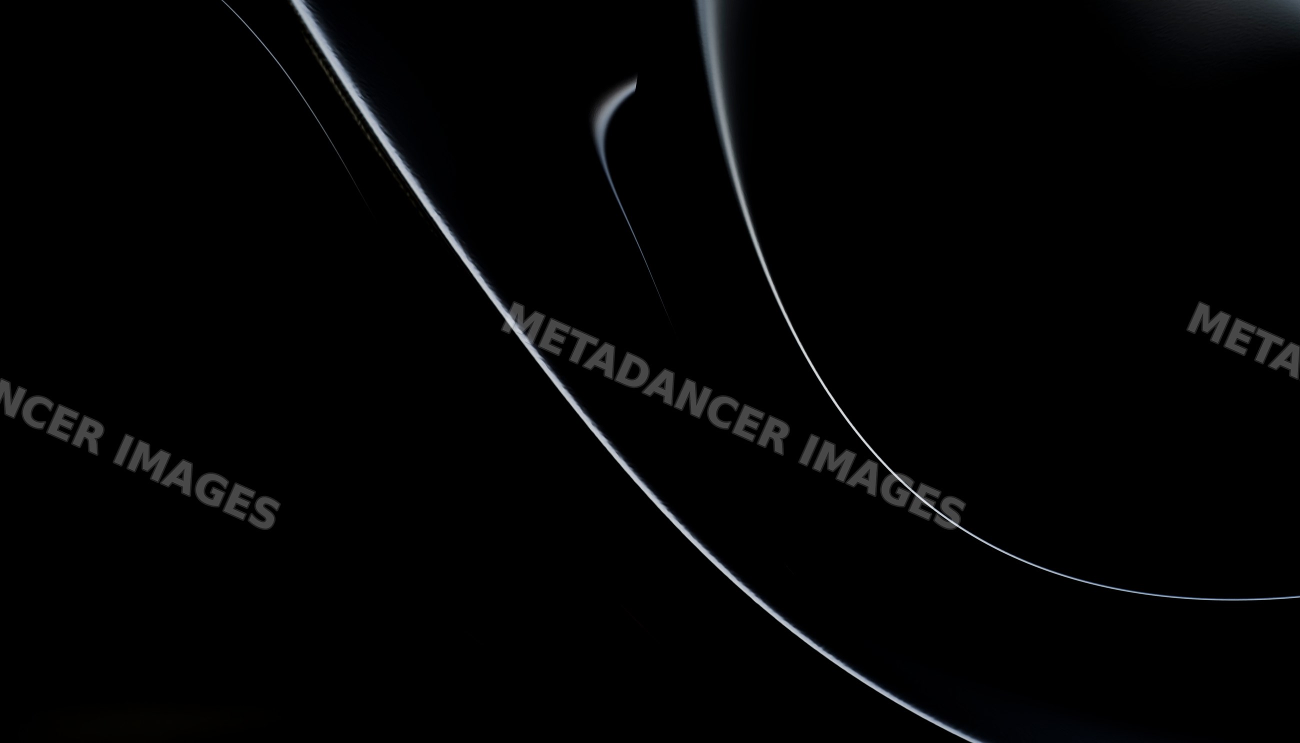 Close-up of black ceramic plates arranged in a minimalist style