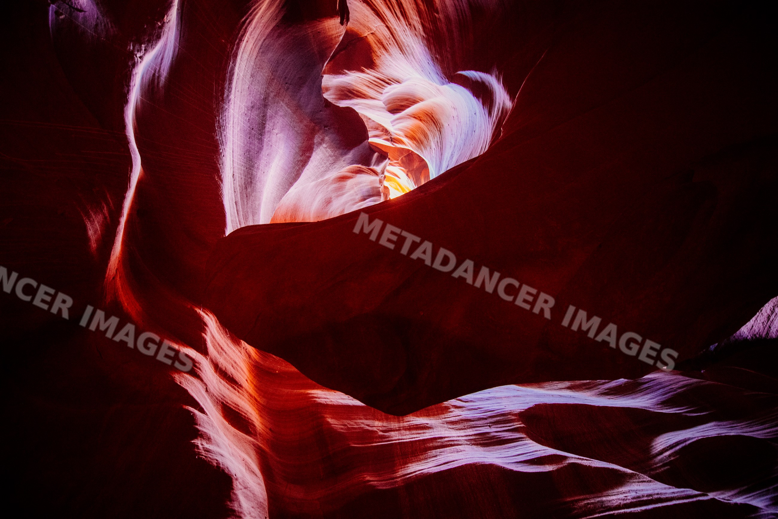 Antelope canyon slot canyon with illuminated sandstone rock formations