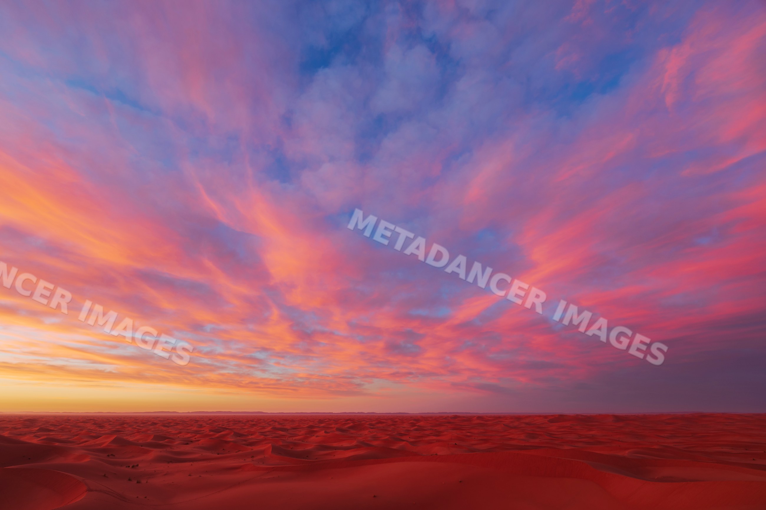 Sunrise over chaggaga sand dunes desert landscape