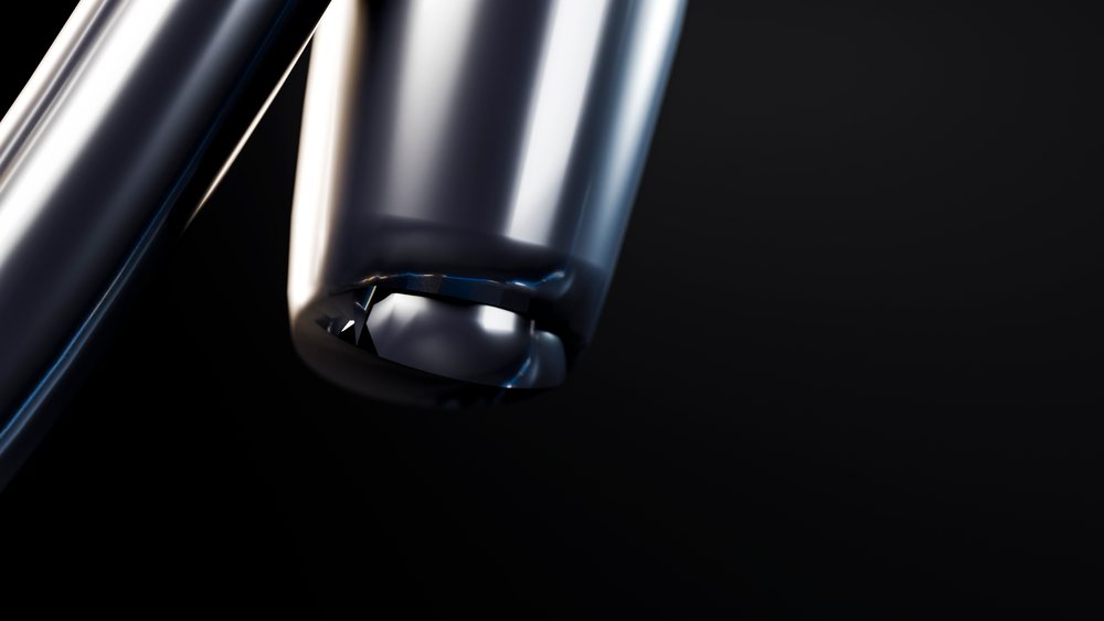 Close-up of shiny metal cylindrical tube with reflective surface
