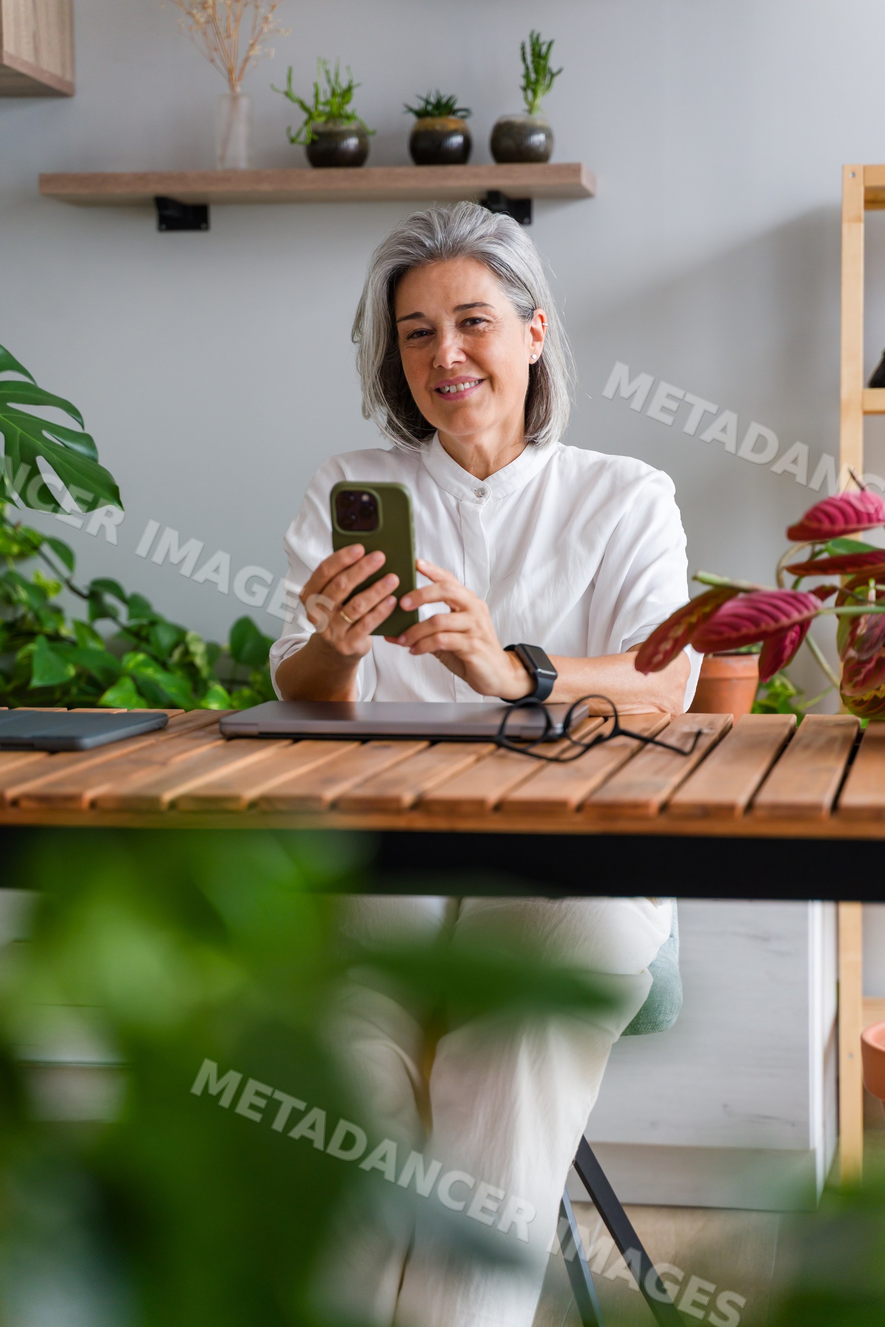 Older white woman using smartphone
