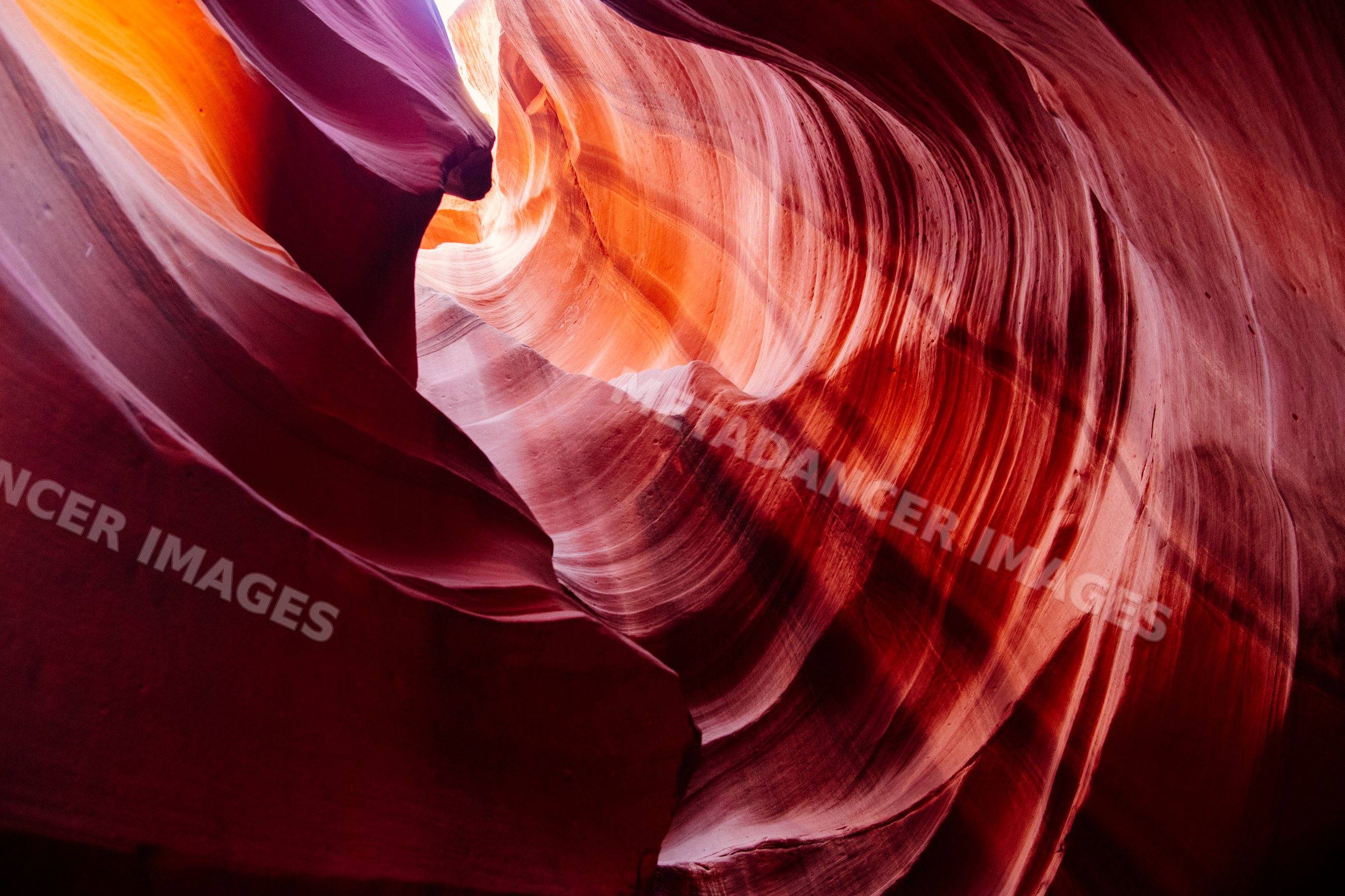 Curved sandstone walls inside antelope canyon in Navajo Land Arizona
