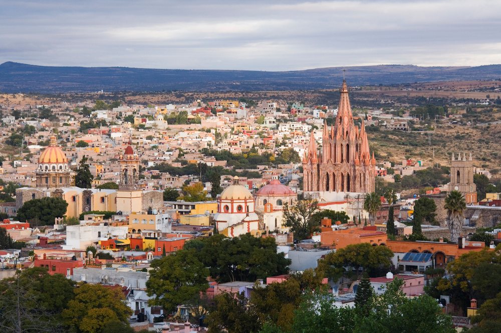 San miguel de allende cityscape with churches, hills