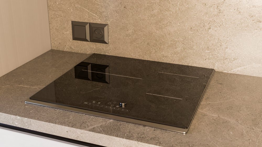 Induction cooktop on marble kitchen countertop