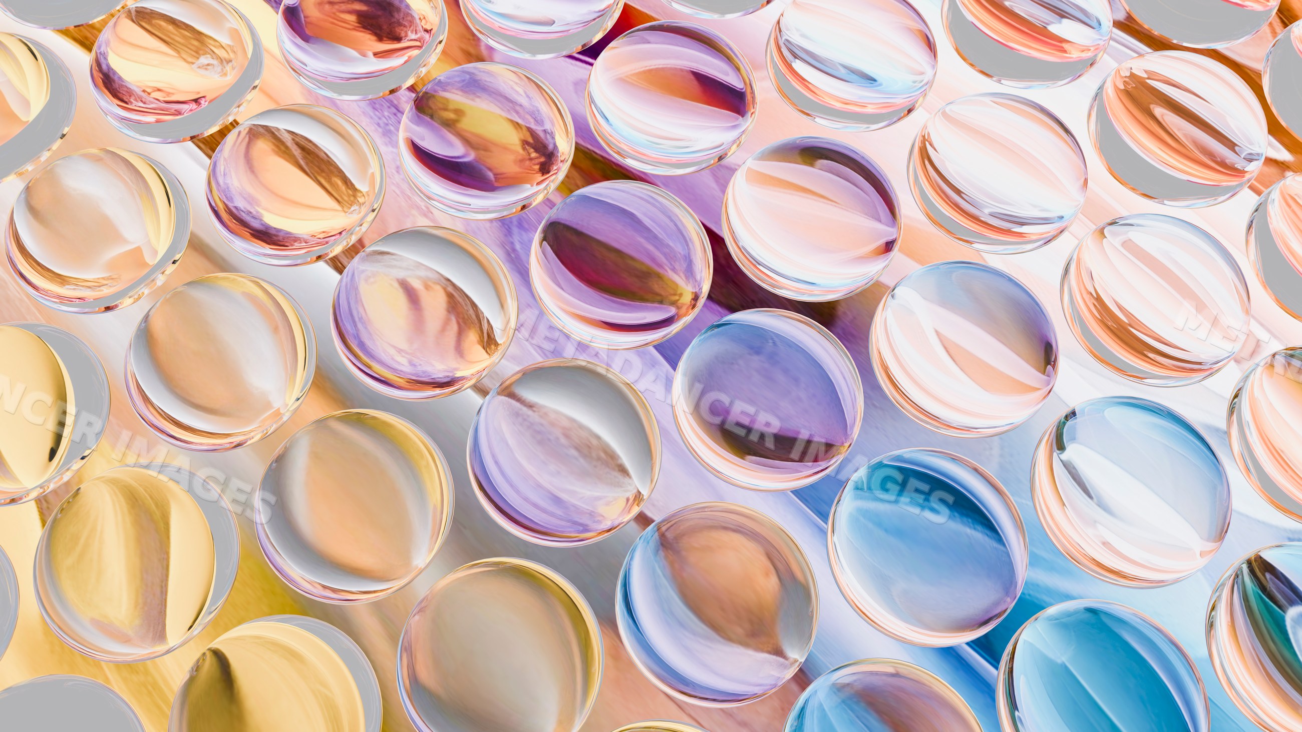 Colorful transparent glass spheres arranged in a pattern