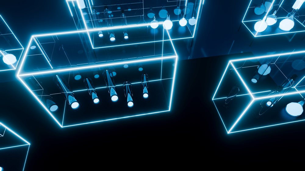Glowing glass bottles in illuminated neon blue transparent cubes