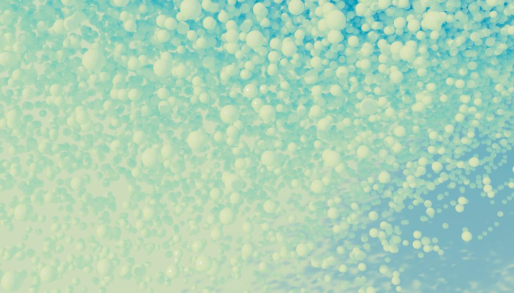 A dense cluster of floating white spheres forming an abstract pattern