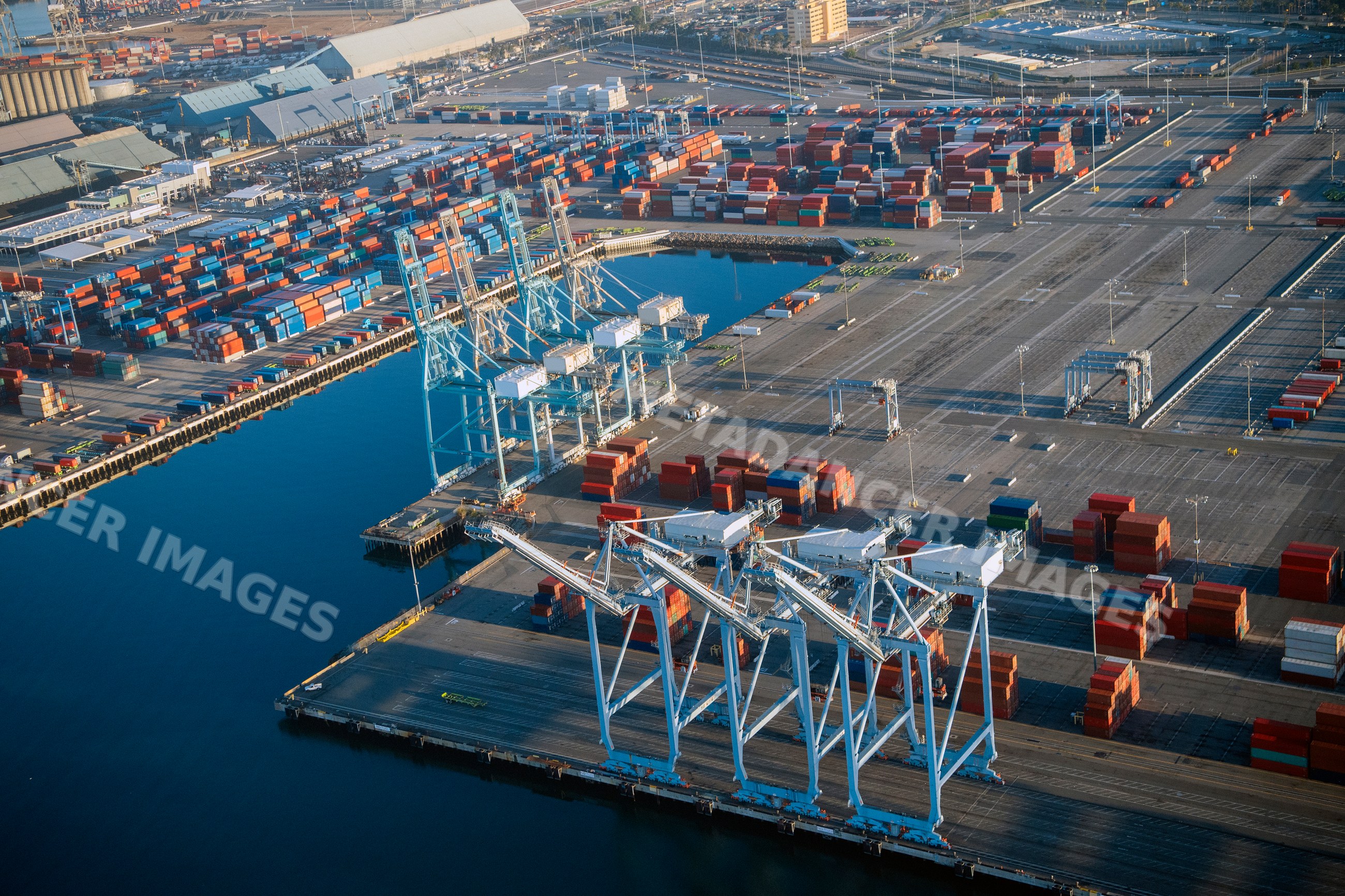 Container cranes and shipping containers at a major port terminal