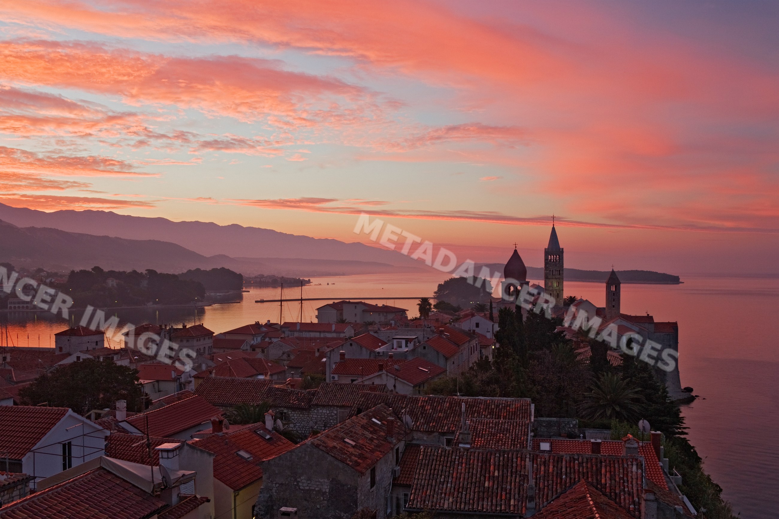 Dawn over rab island seaside town