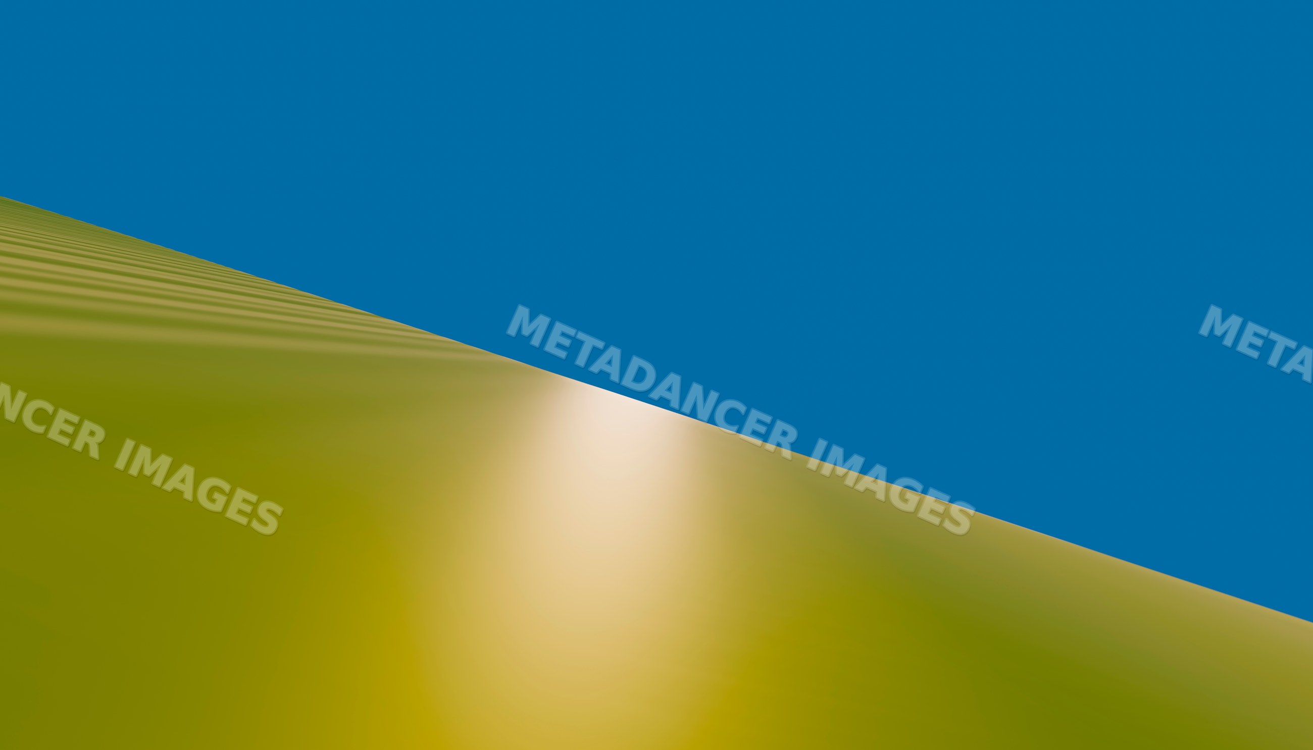 Sand dune with sunlight reflection in clear blue desert sky