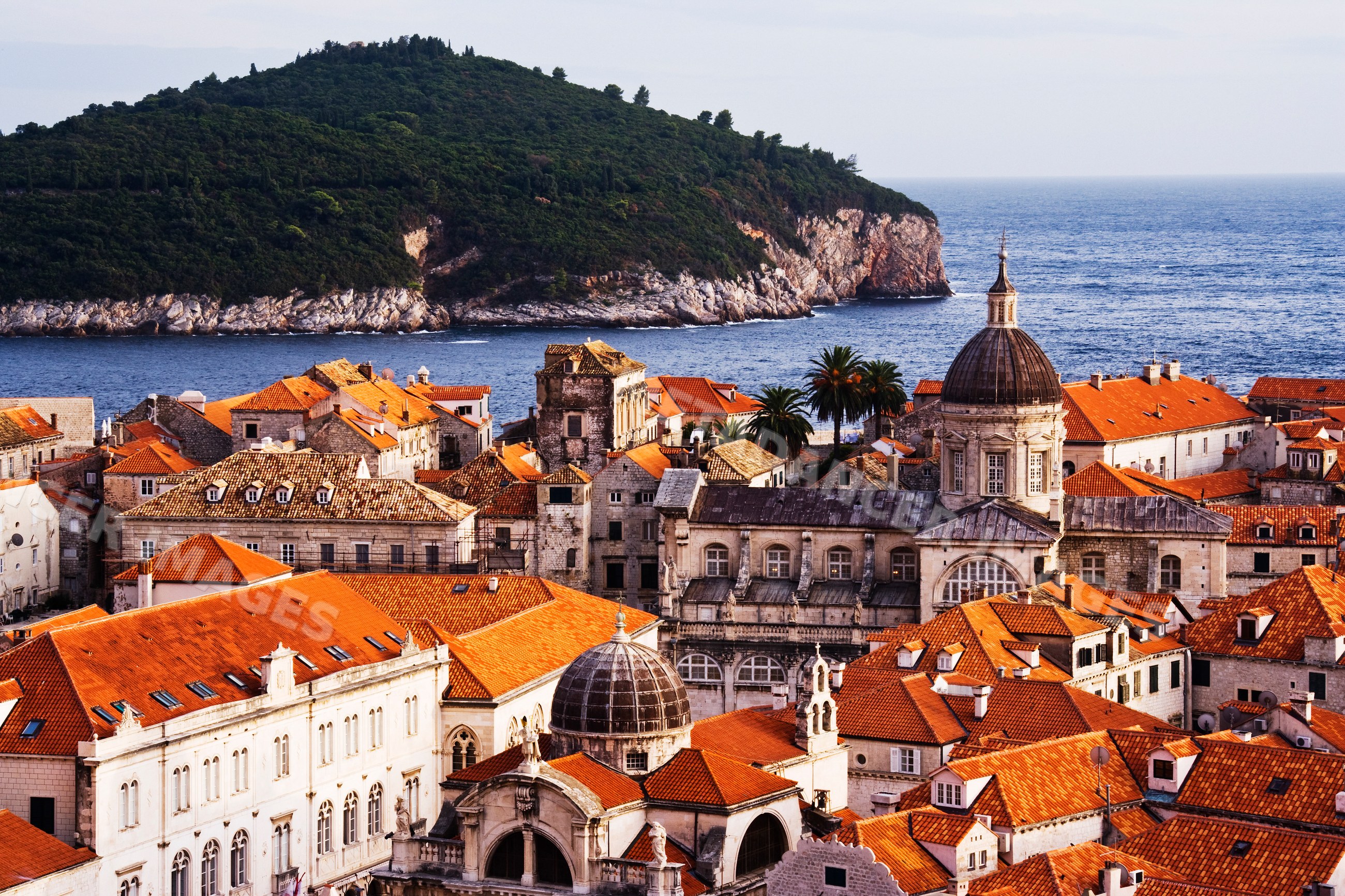 Old town of dubrovnik and lokrum island by adriatic sea