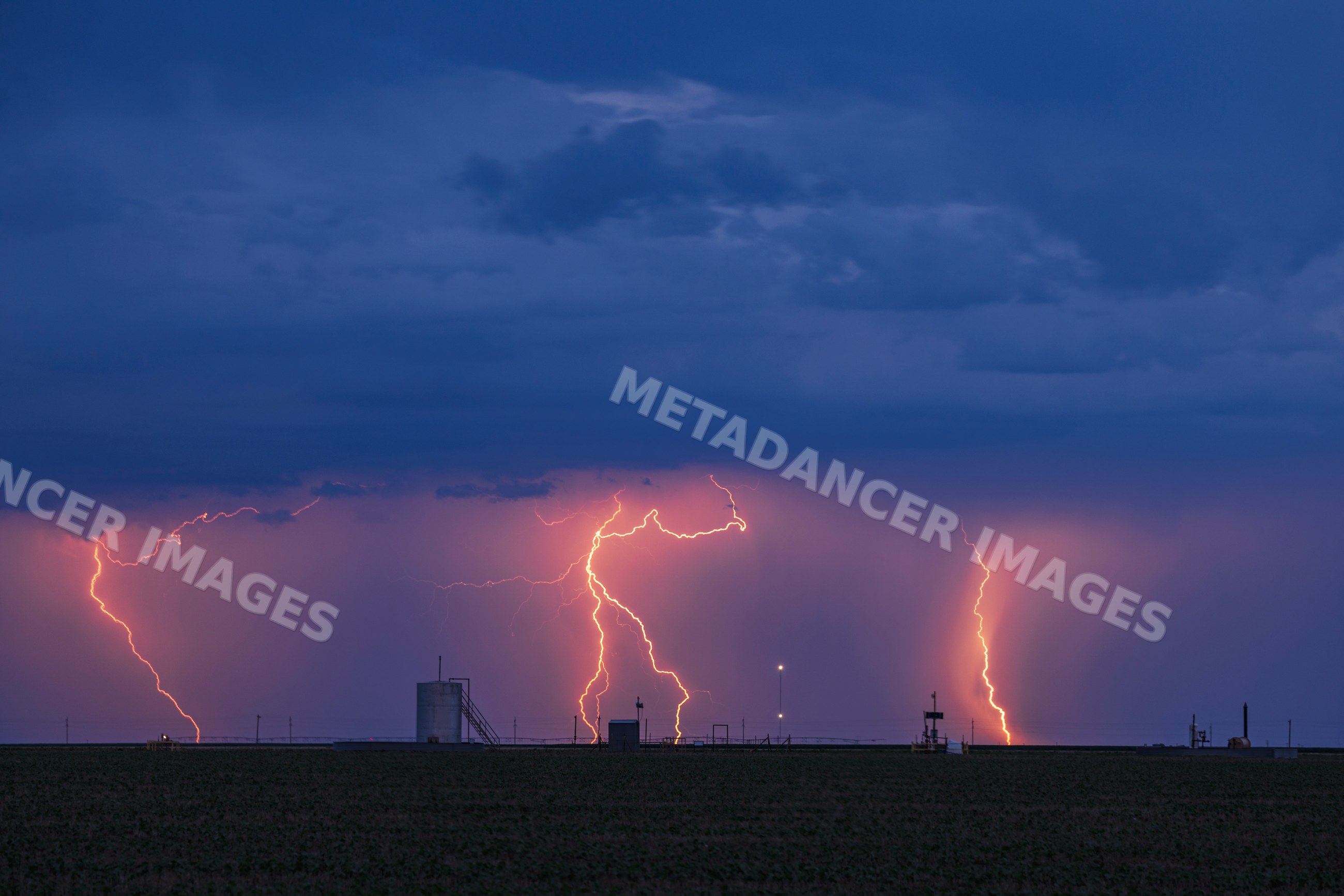 Lightning storm over farm fields in perryton, texas