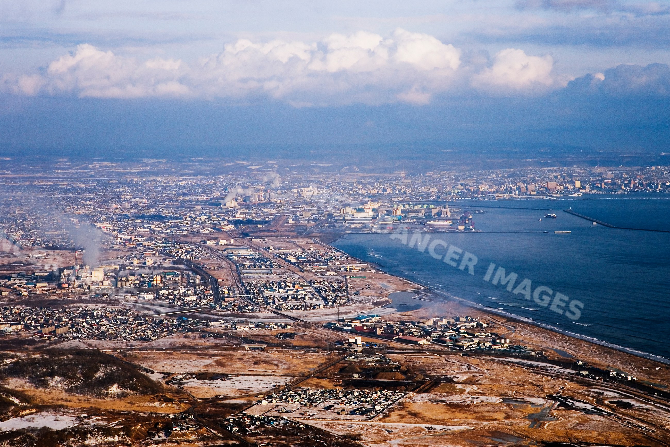 Aerial view of kushiro cityscape with coastal industrial area Japan