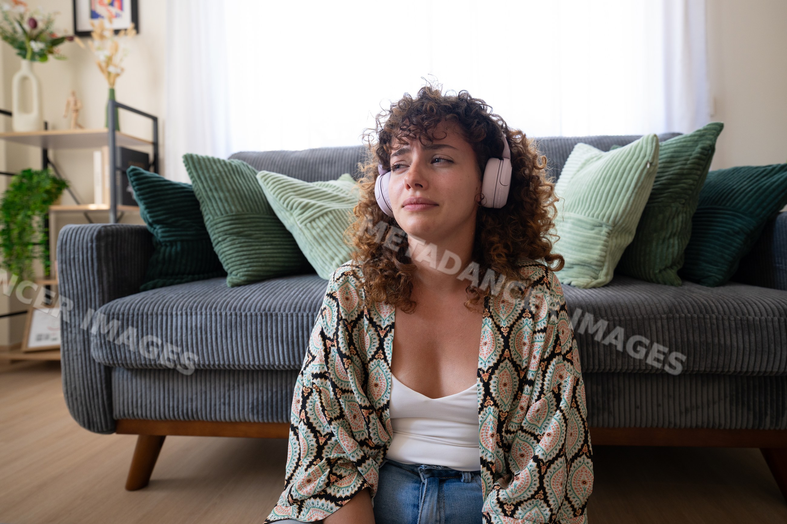 White woman sitting on floor