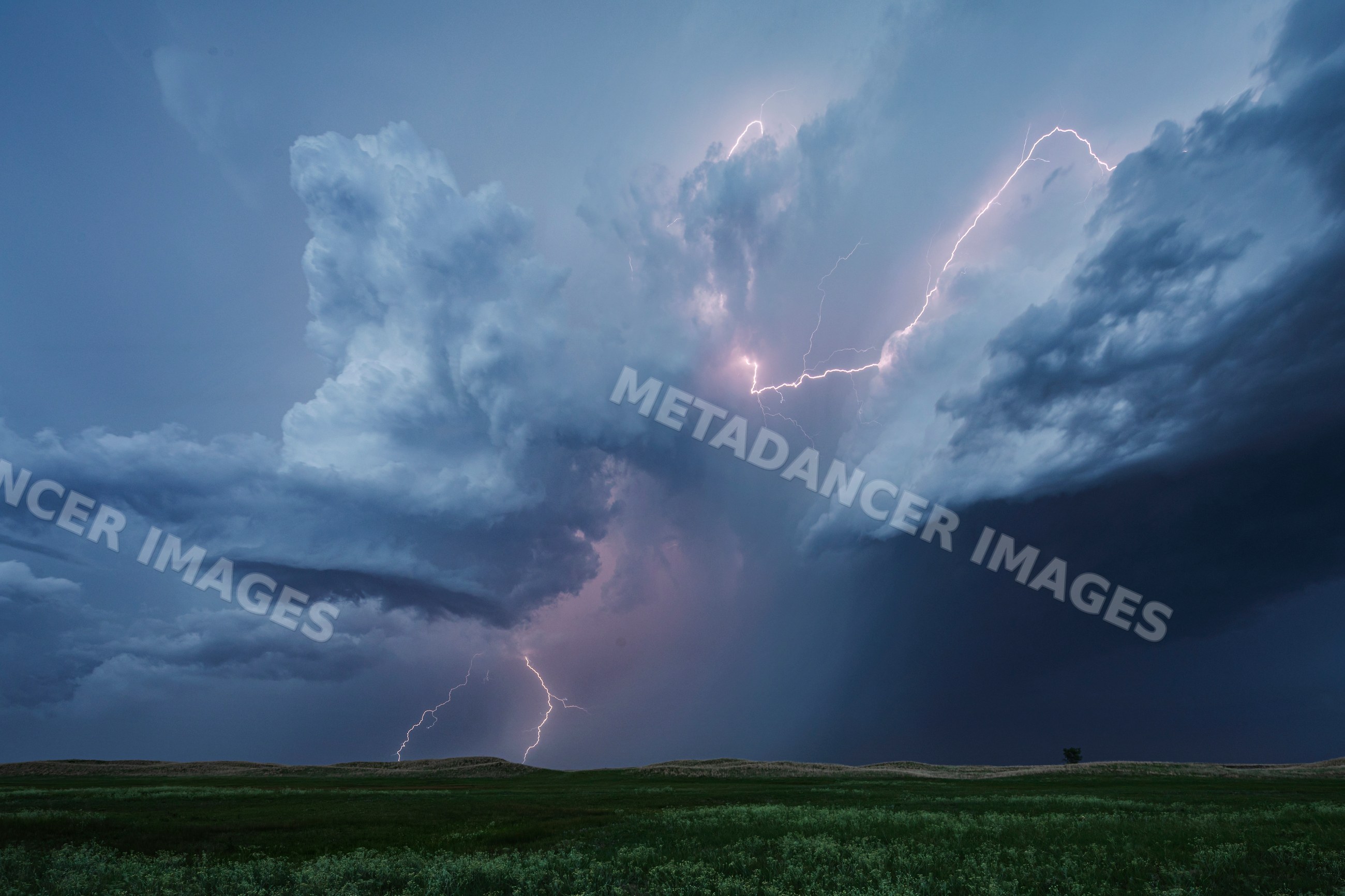 Lightning Strike over nebraska sandhills during blue hour