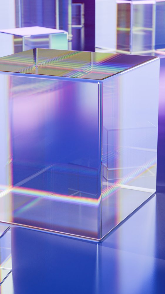 Transparent glass cubes reflecting colorful light spectrum