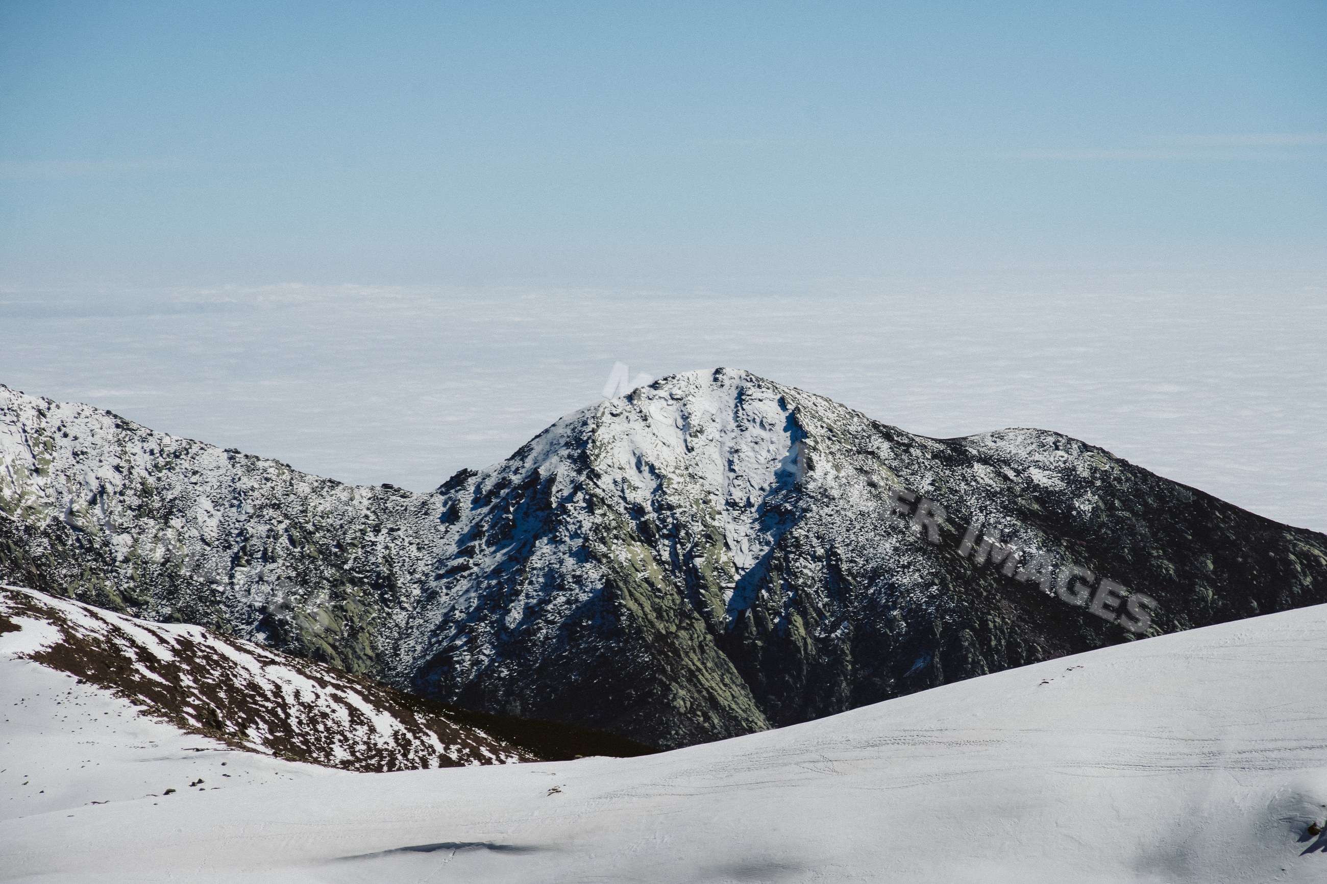 Snowy mountain peak in a winter landscape