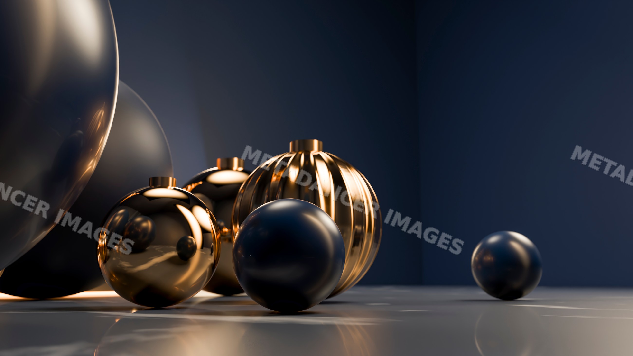 Decorative metallic black and gold spheres on reflective surface