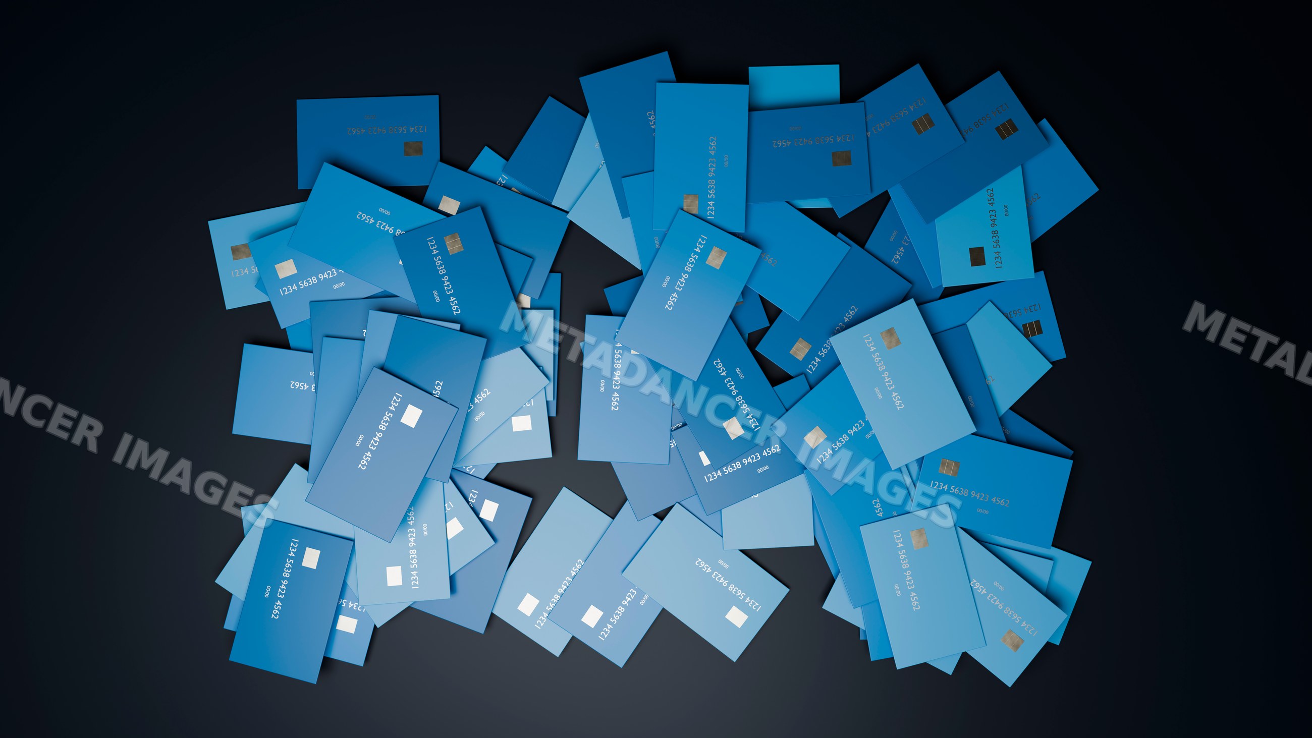 Pile of blue credit cards with chip and numbers on dark background