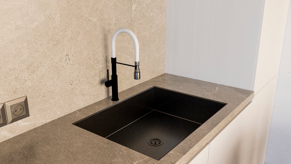 Modern kitchen sink with black basin and white curved faucet