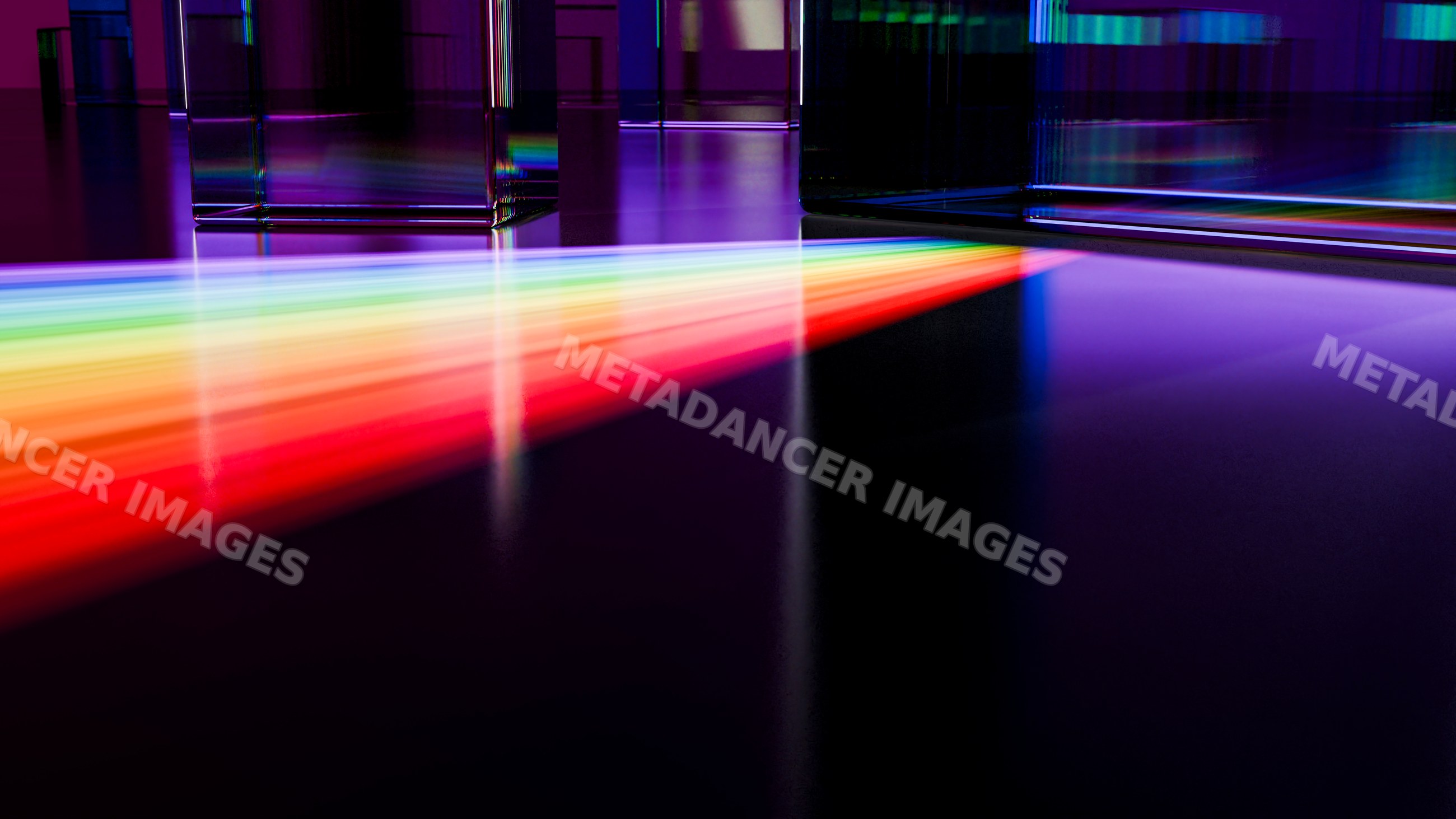 Light spectrum dispersed by glass prisms on reflective surface