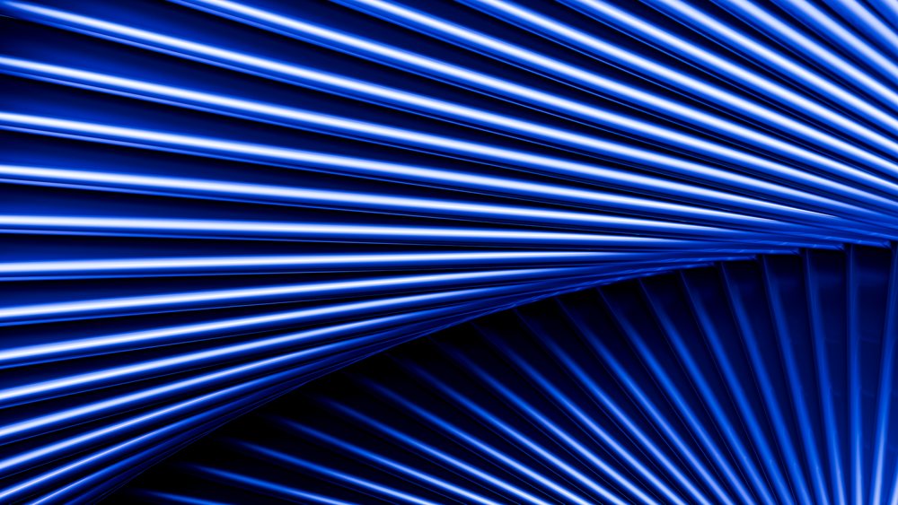 Abstract blue curved lines forming symmetrical wave pattern