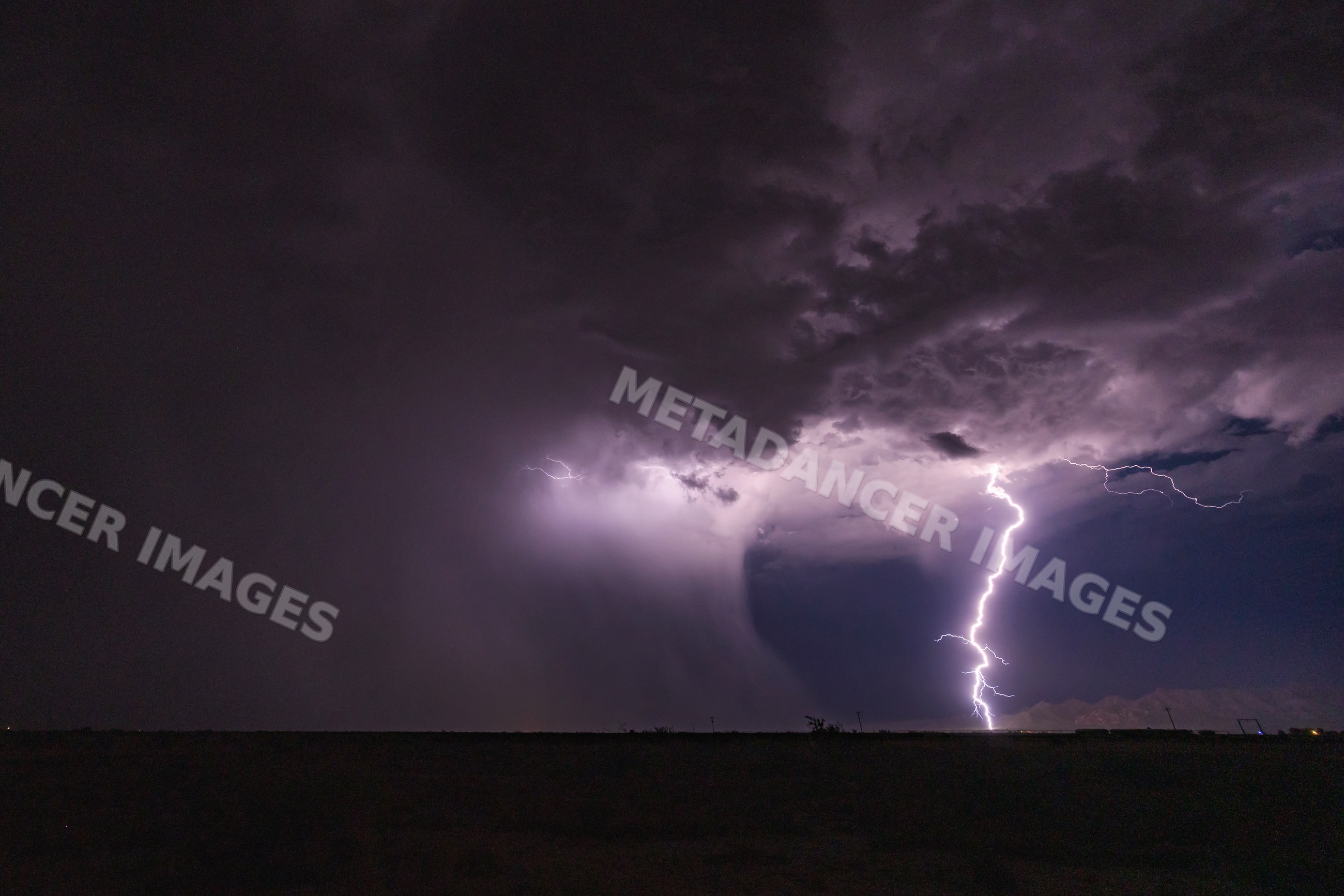 Lightning bolt from Thunderstorm at night in mcneal, Arizona