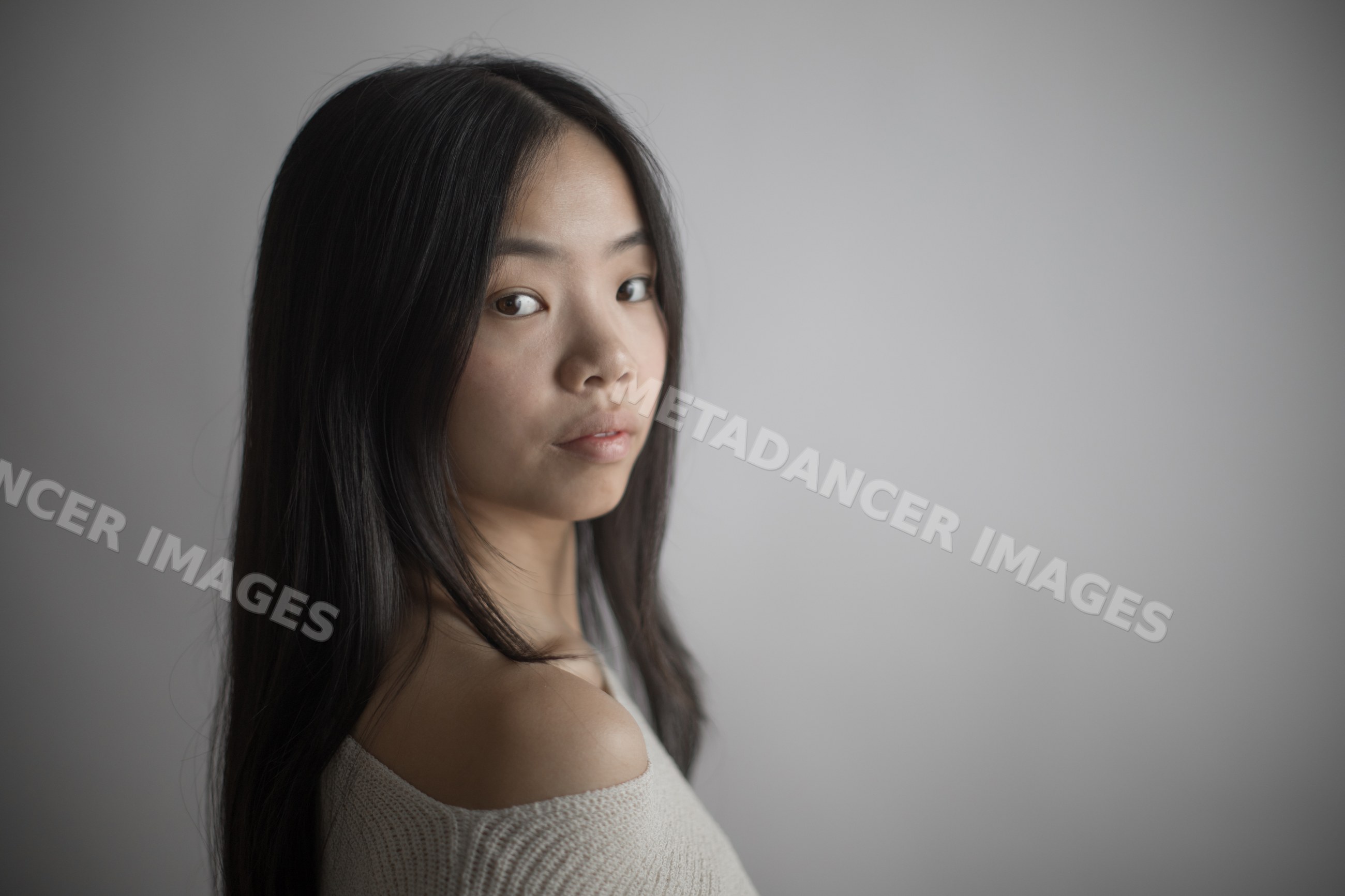 Emotional portrait of asian Southeast Asian woman with long hair