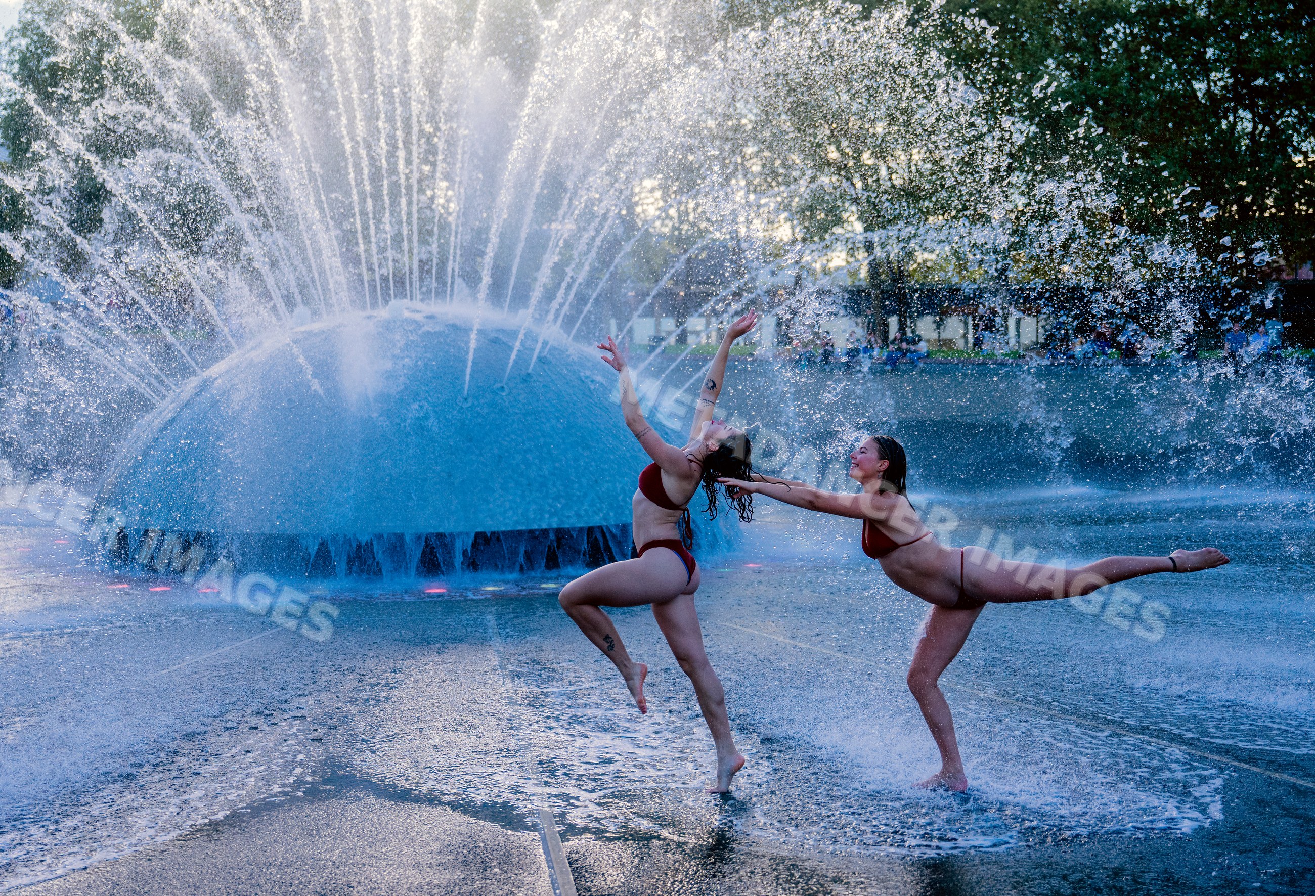 White women performing acrobatic dance moves