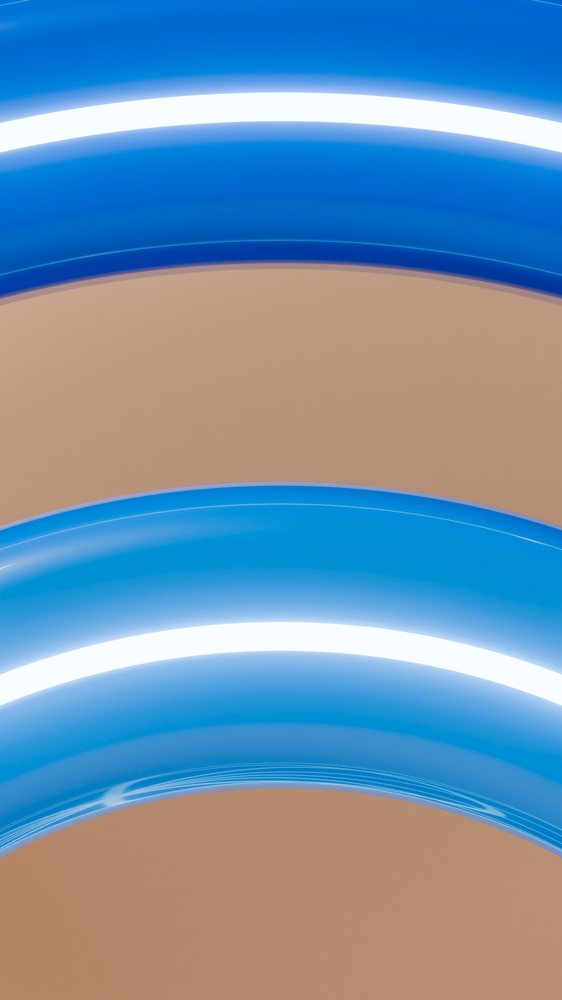 Glossy blue curved rings with reflections in abstract design