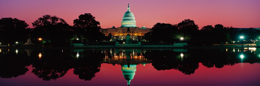 Capitol building at dusk with reflection