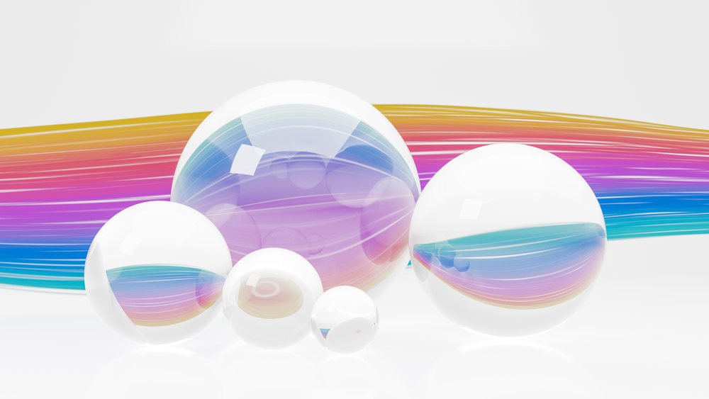 Transparent spheres reflecting colorful light streaks