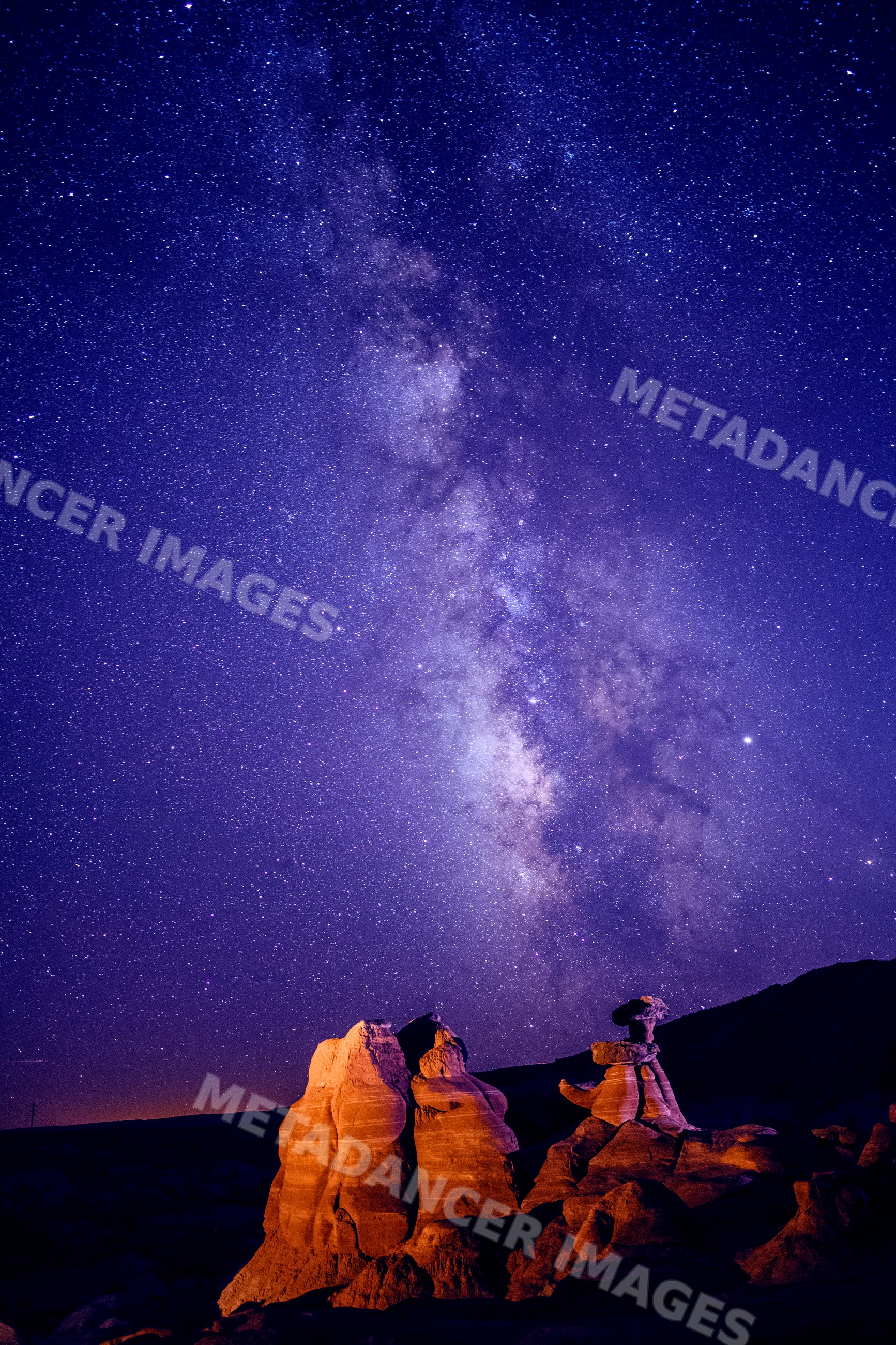 Milky way over rock formations in Utah's buckskin gulch slot canyon
