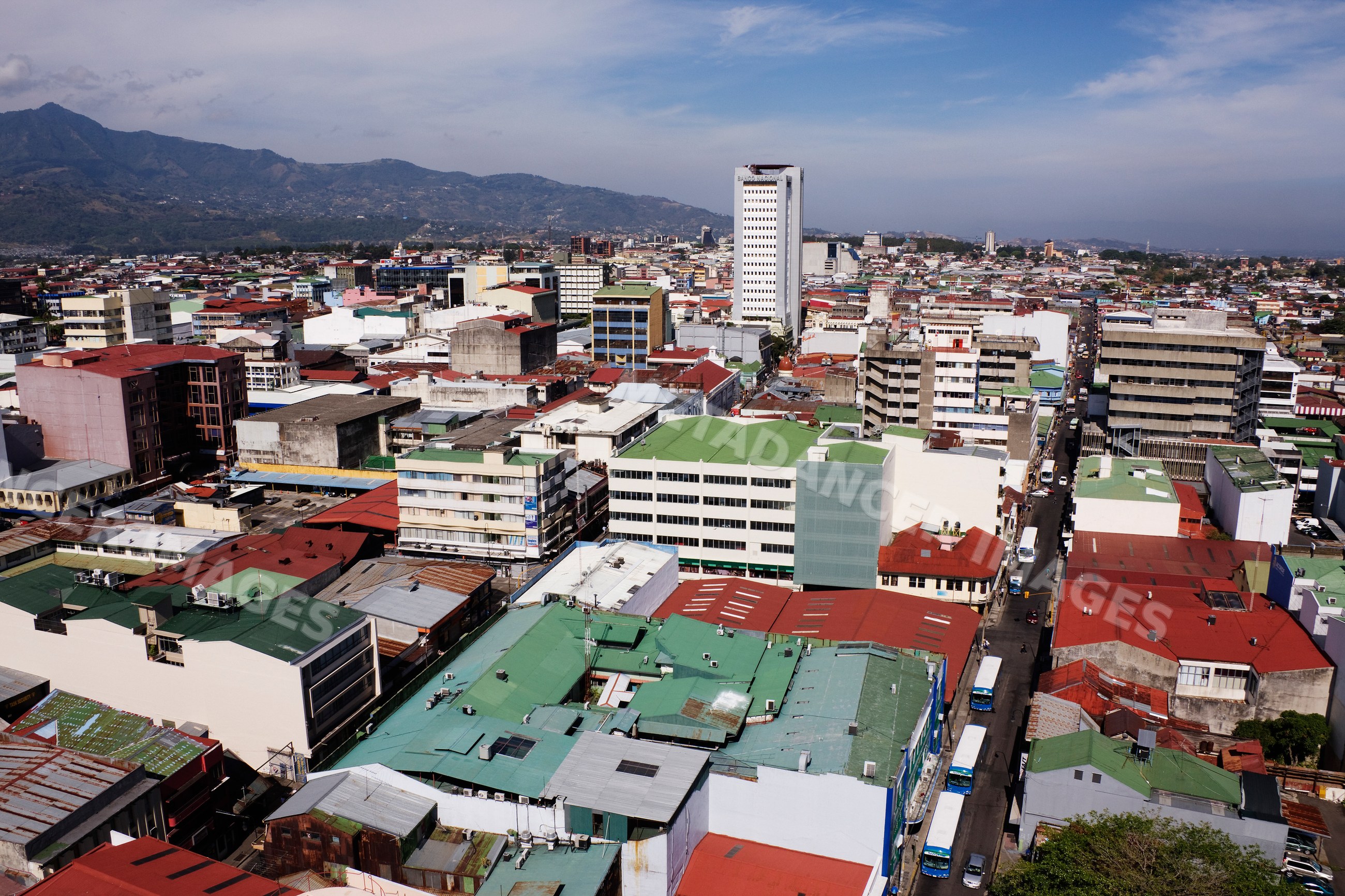 Cityscape of san jose, costa rica with urban buildings and mountains