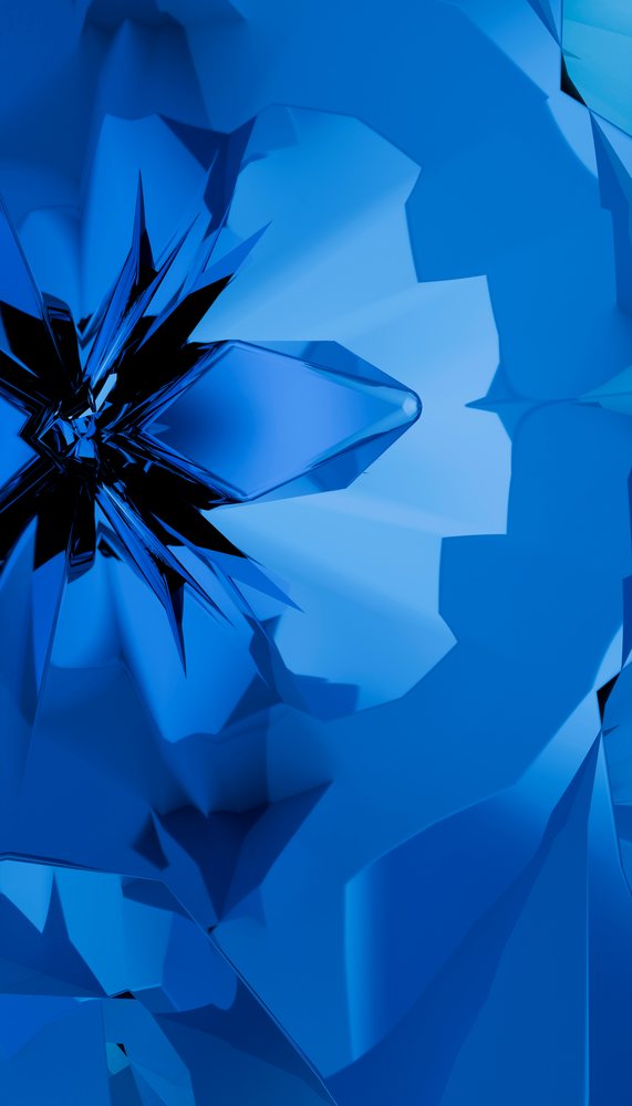 Abstract 3d render of faceted blue geometric crystal shapes