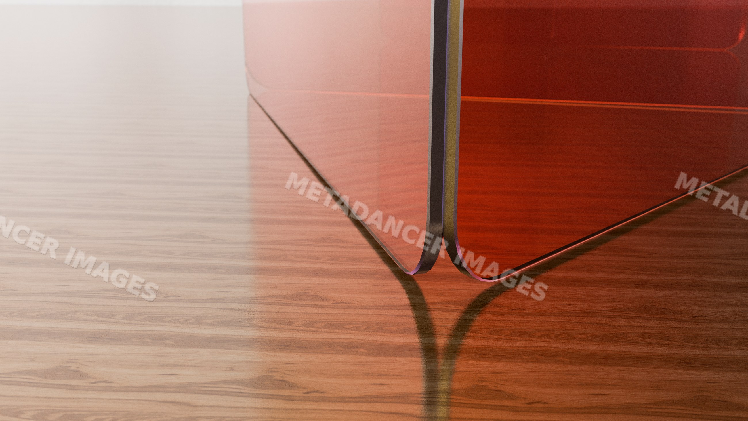Close-up of red glass panel corner on wood floor with reflective