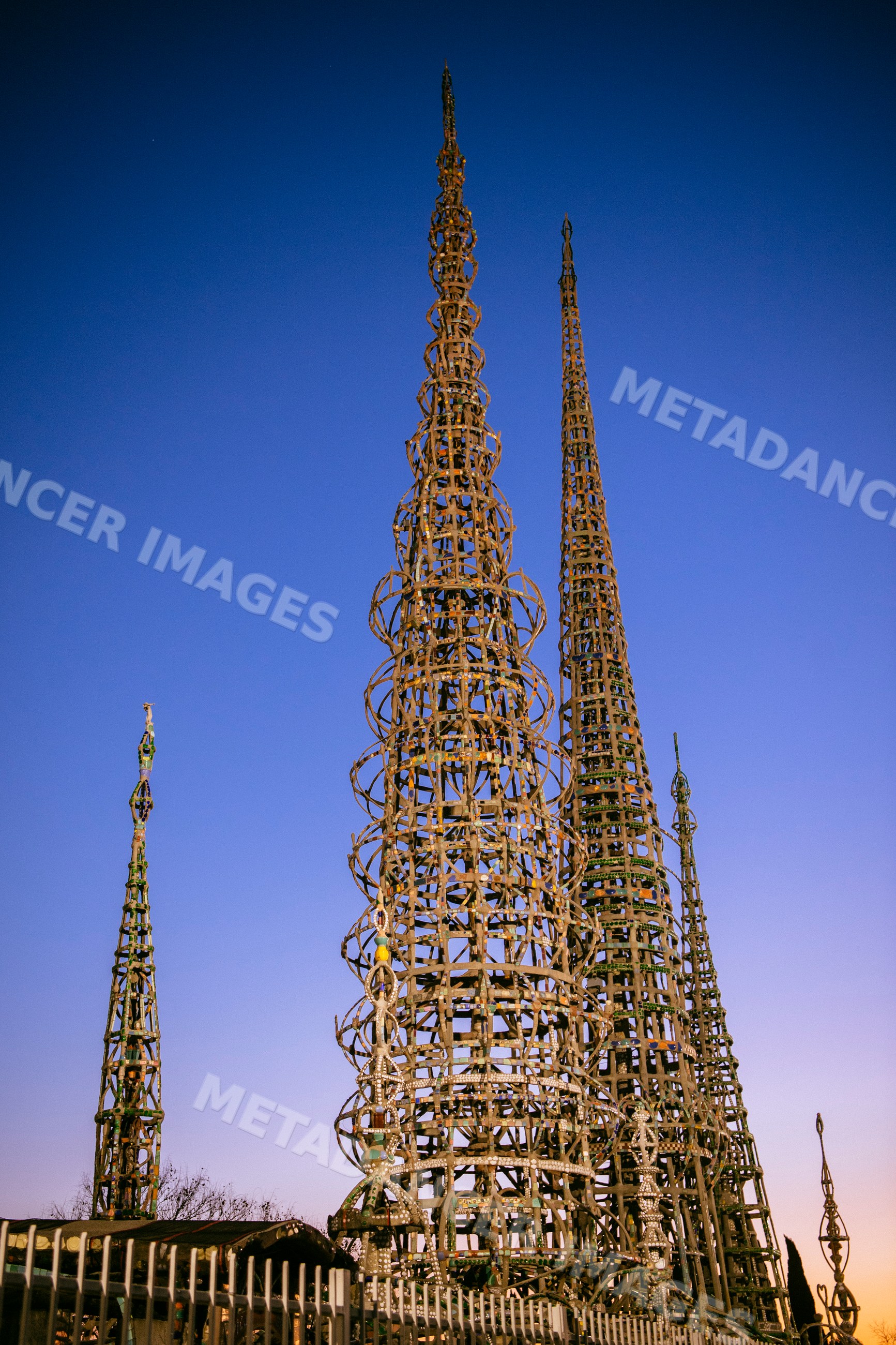 Watts towers metal sculptures at sunset in California, USA