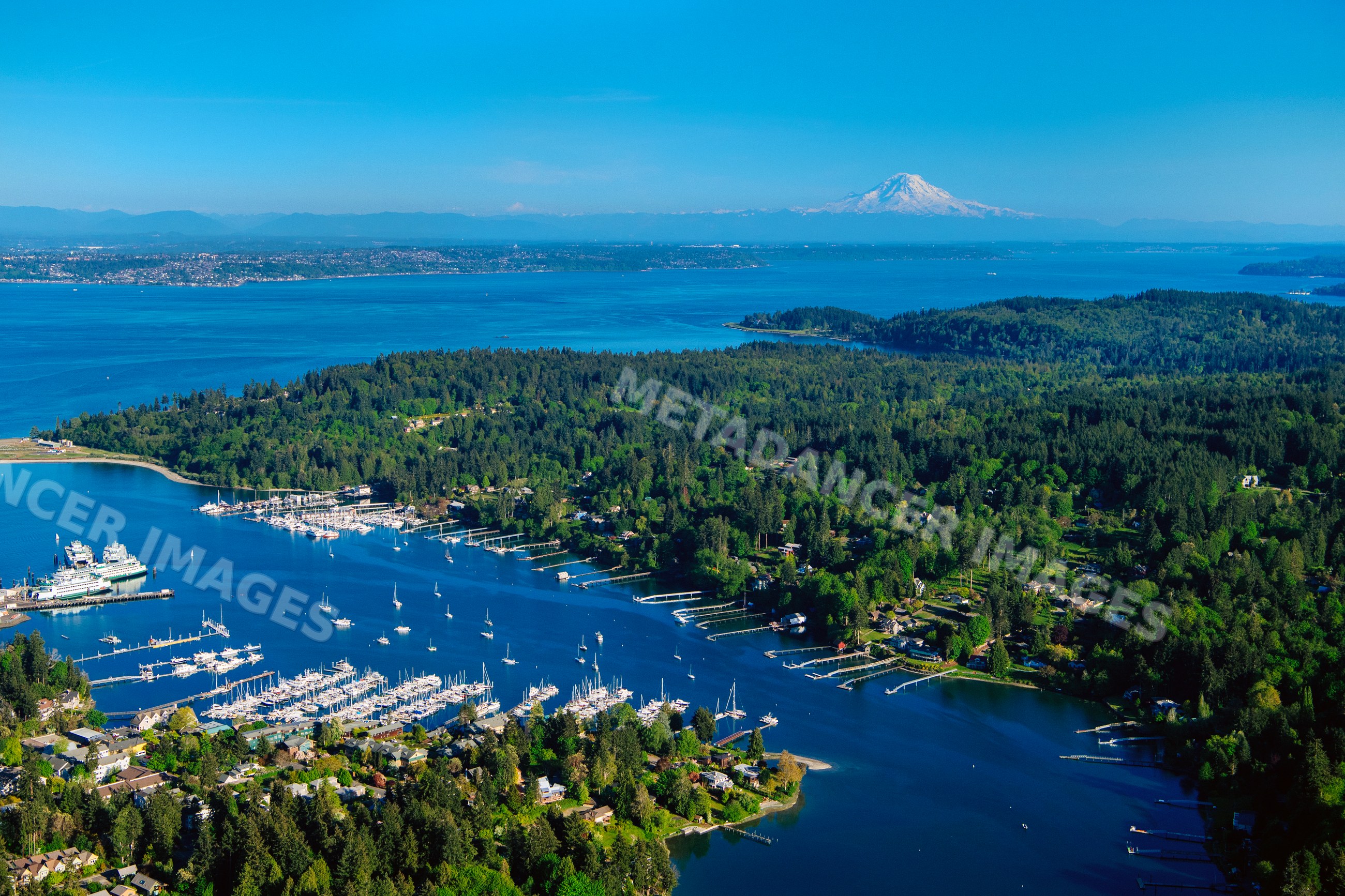 Aerial view of Bainbridge Island Eagle Harbor with boats and mount