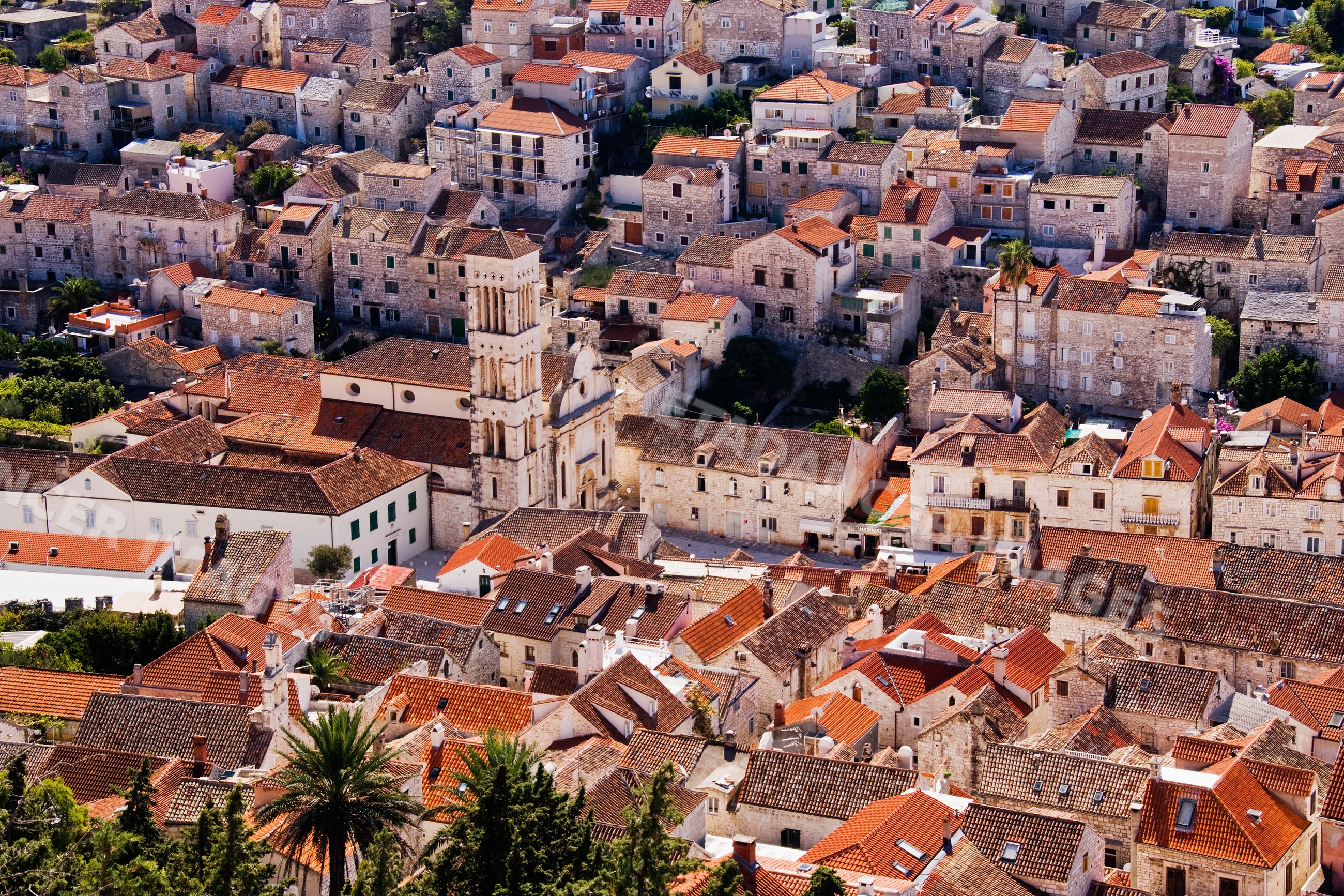 Town of hvar with historic stone buildings and church tower